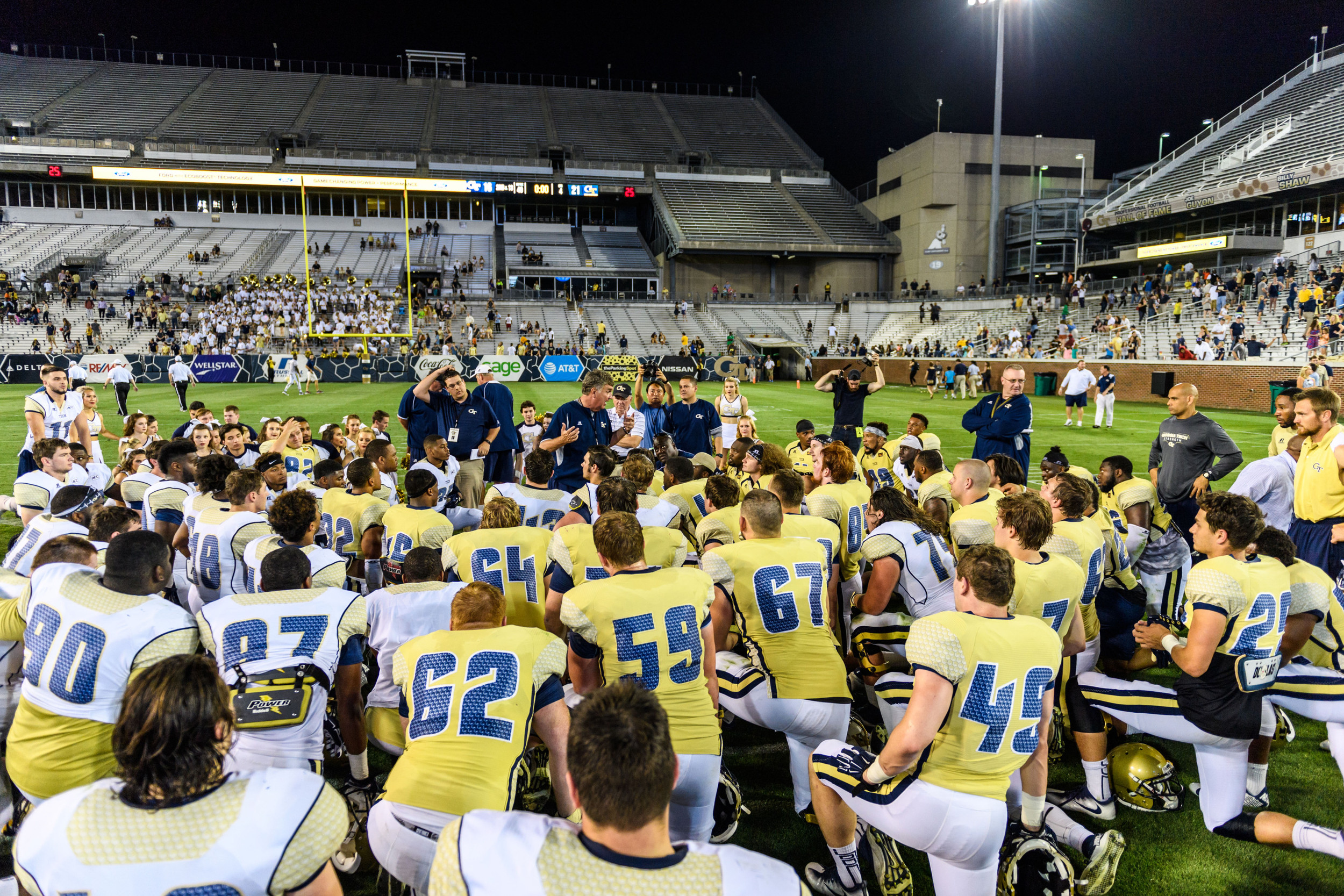 Coach Johnson talks to the team after the game