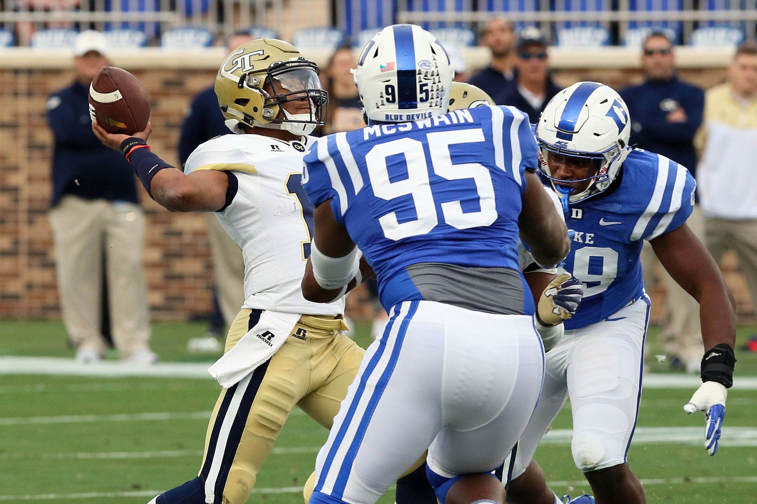 Nov 18, 2017; Durham, NC, USA; Georgia Tech Yellow Jackets quarterback TaQuon Marshall (16) throws to a receiver against the Duke Blue Devils defense in the first half at Wallace Wade Stadium. Mandatory Credit: Mark Dolejs-USA TODAY Sports