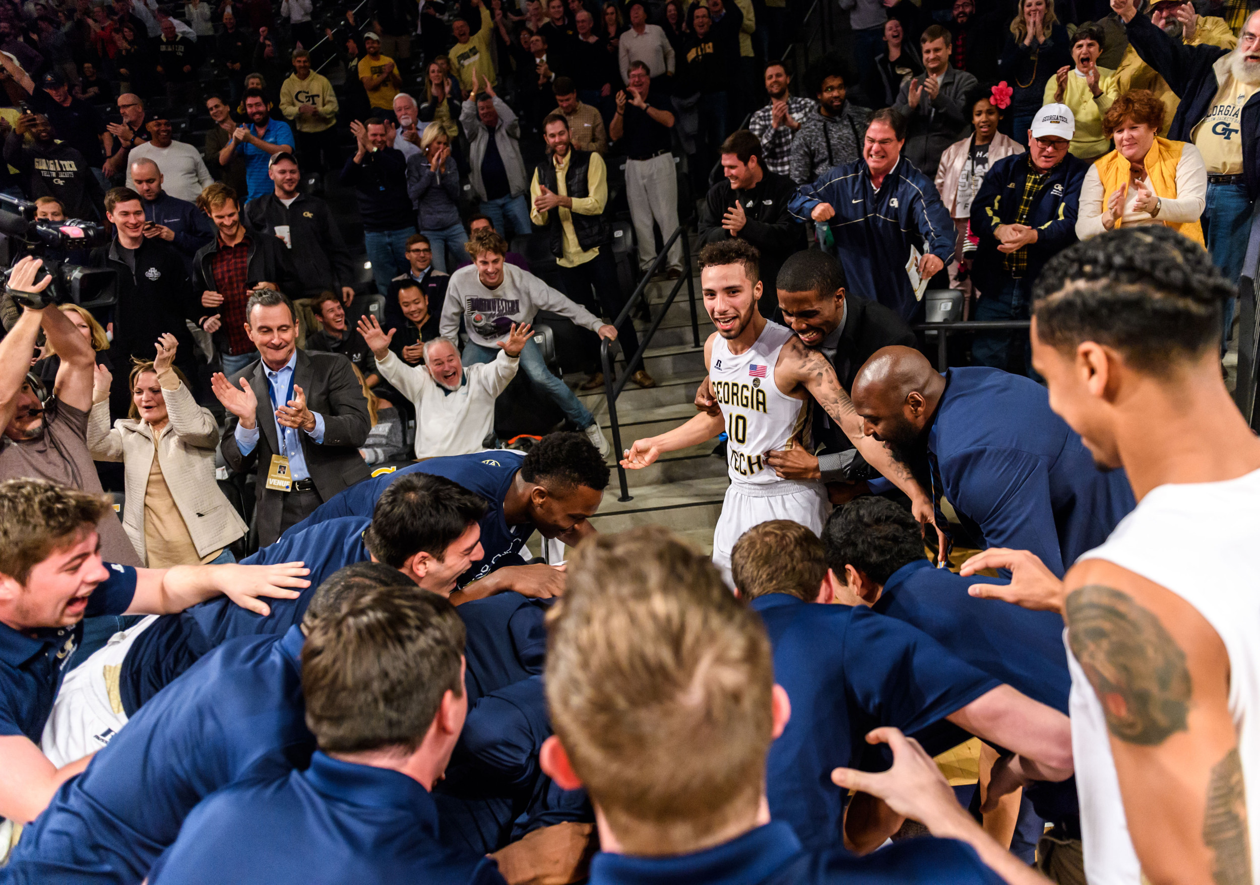The Jackets swarm Tadric Jackson after the buzzer beater