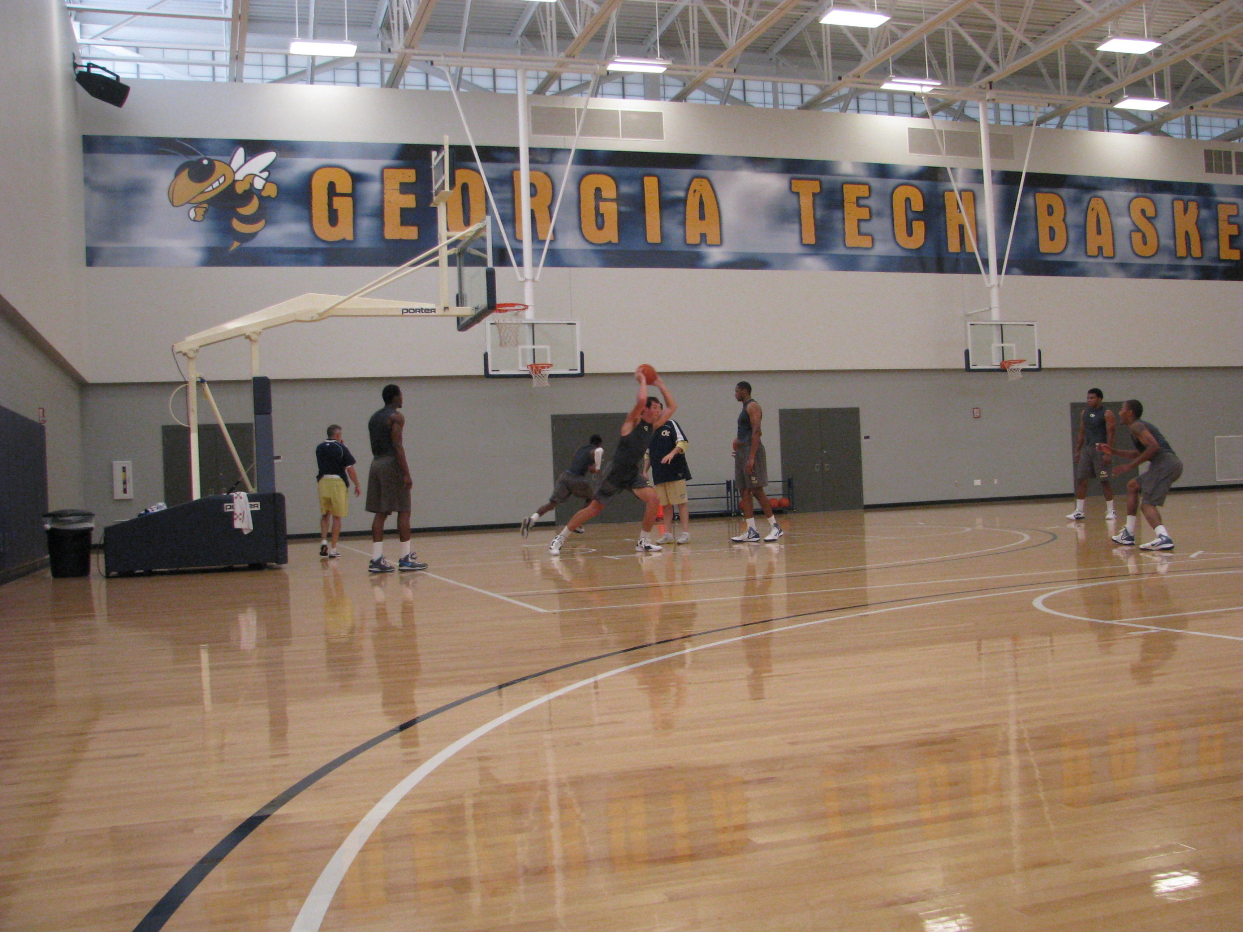 Coach Gregory puts the Yellow Jackets through a 40-minute practice Thursday at Zelnak Center. - June 21, 2012