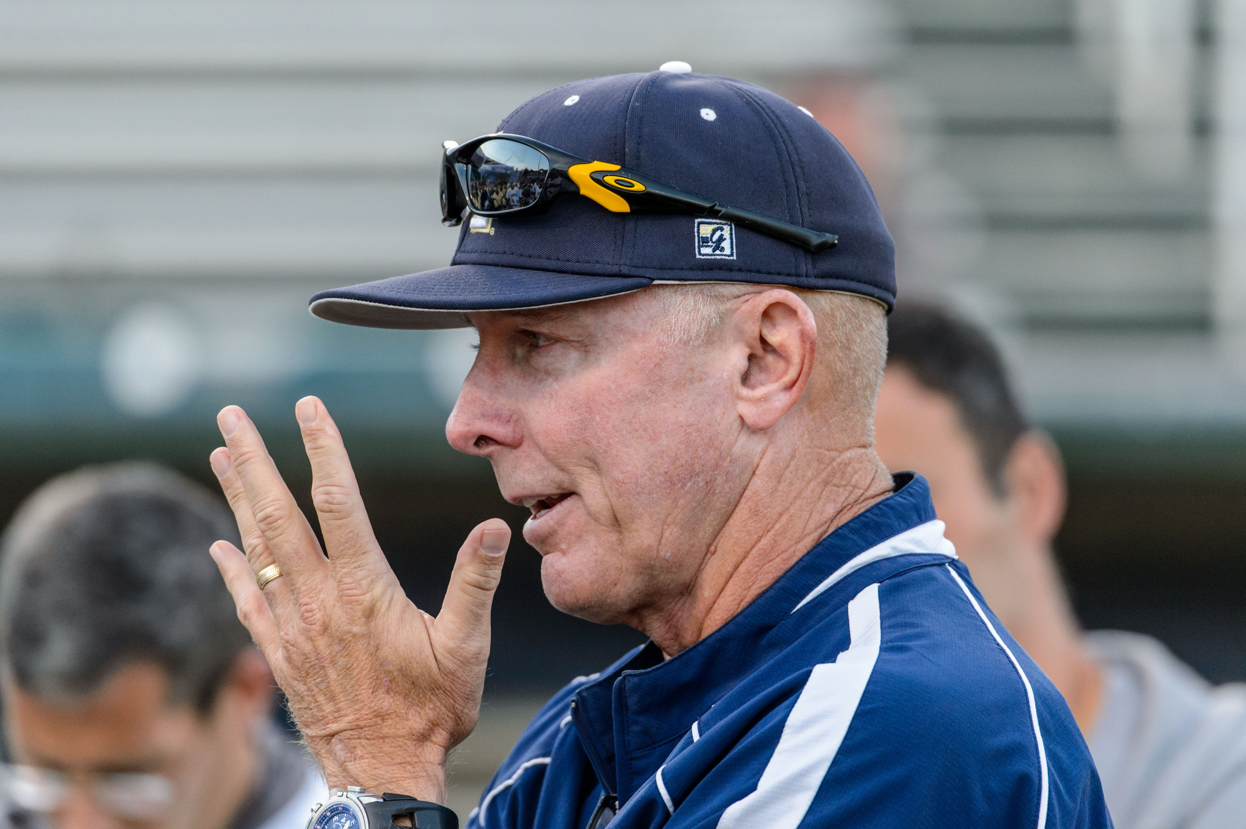 Coach Danny Hall addresses the team after the game