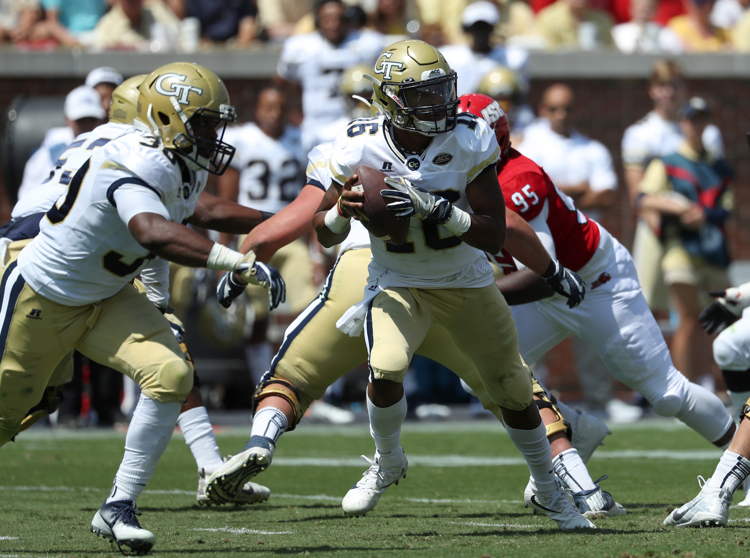 Yellow Jackets quarterback TaQuon Marshall (16) drops back to pass. Jason Getz-USA TODAY Sports