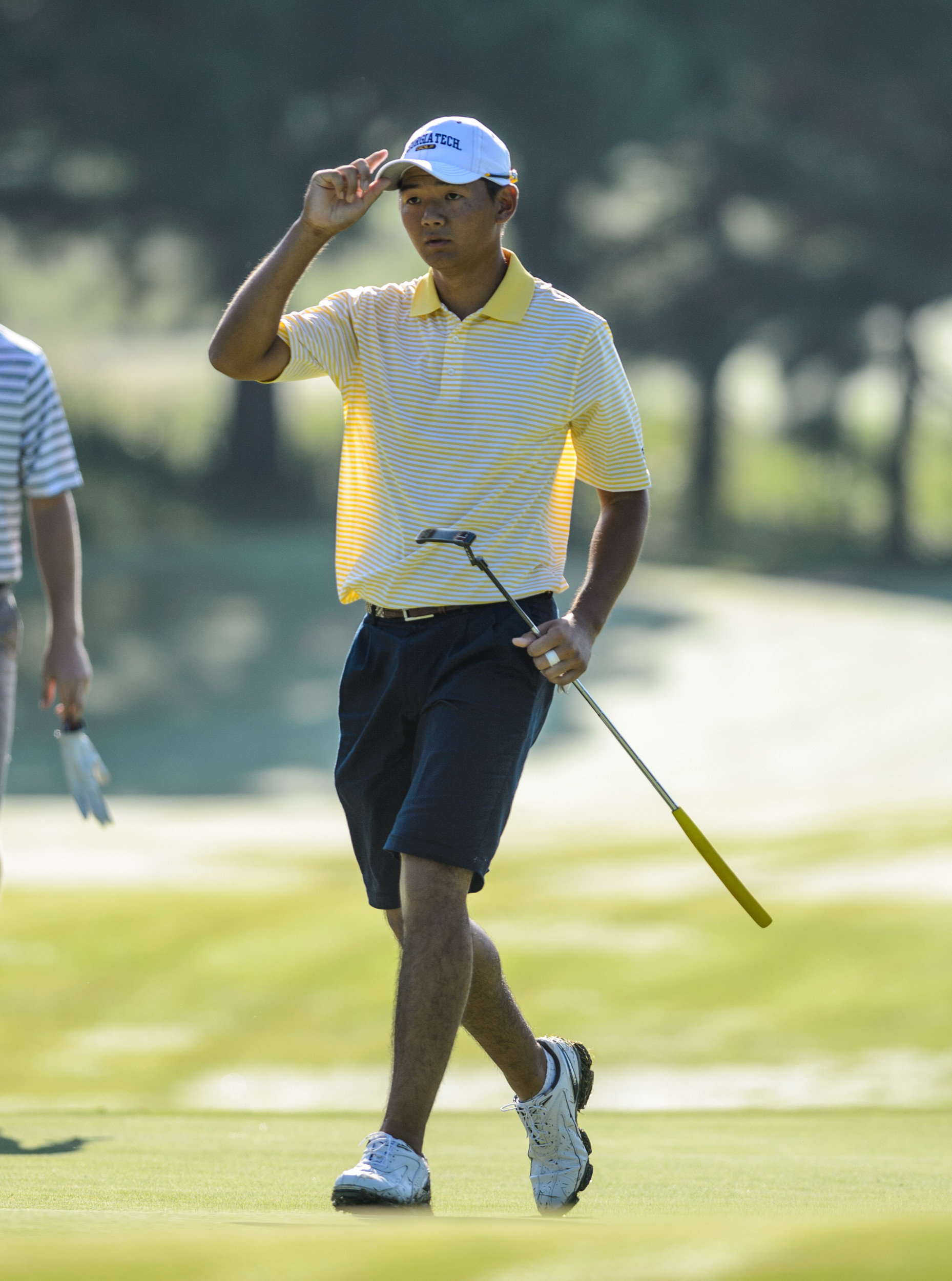 Shun Yat Hak freshman golfer 2012-13