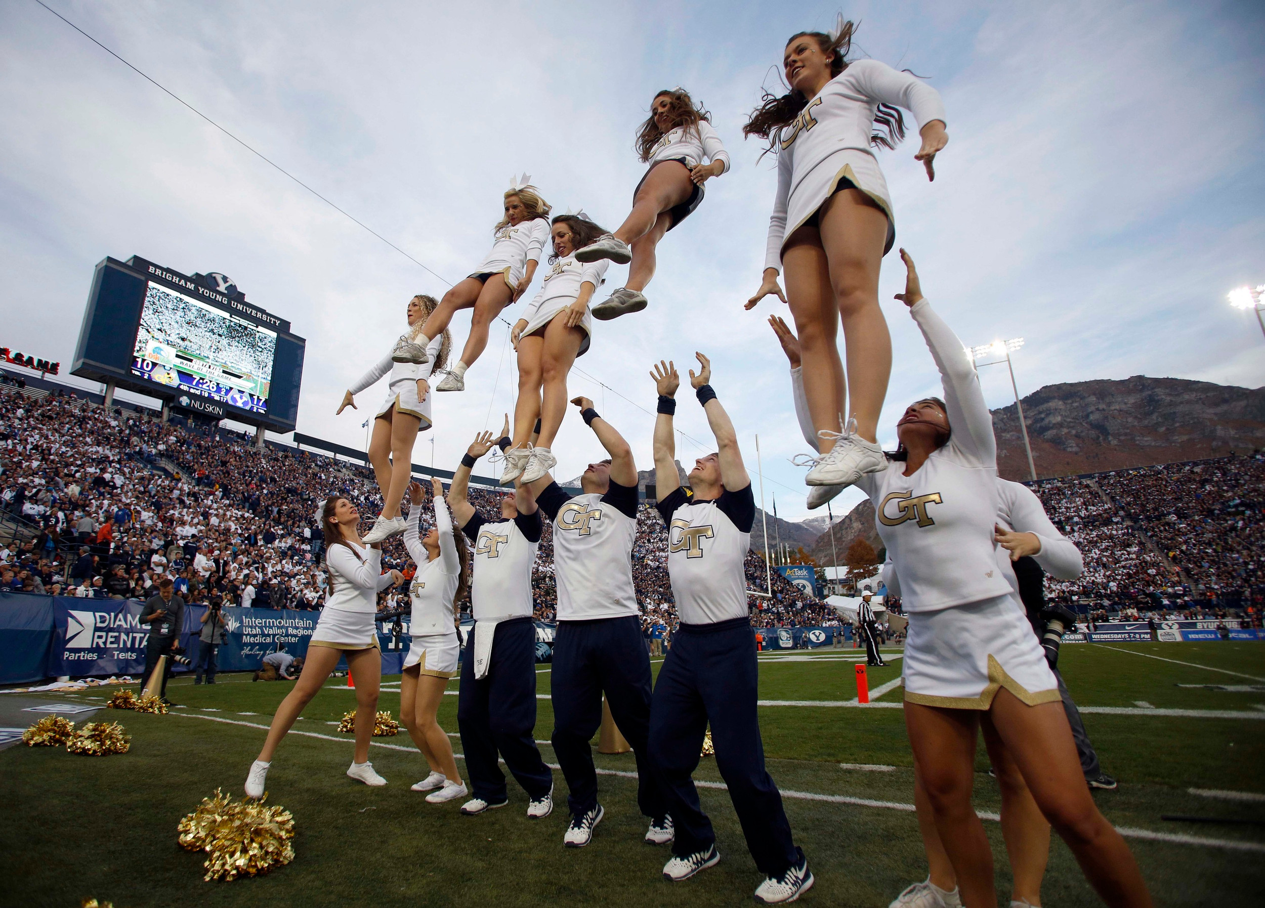 Georgia Tech Yellow Jackets cheerleaders perform during the second quarter of a football game against the Brigham Young Cougars at Lavell Edwards Stadium. (Jim Urquhart-USA TODAY Sports)