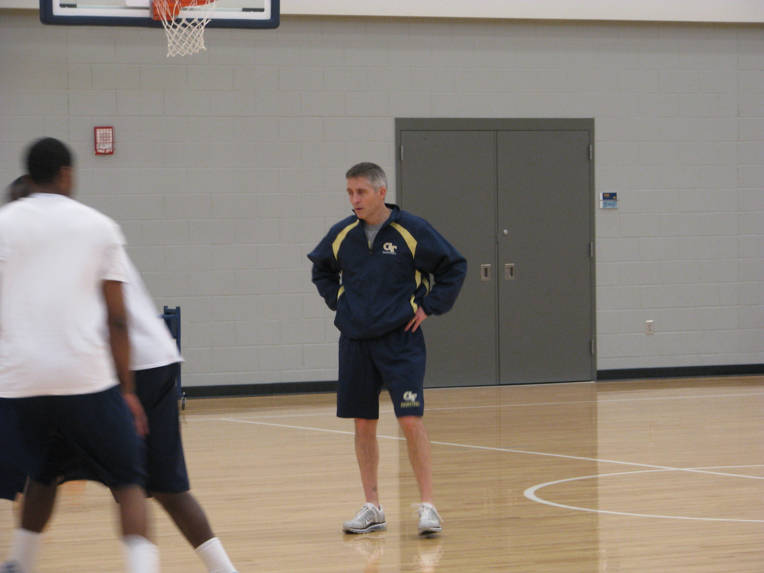 Head coach Brian Gregory puts the Yellow Jackets through individual workouts.