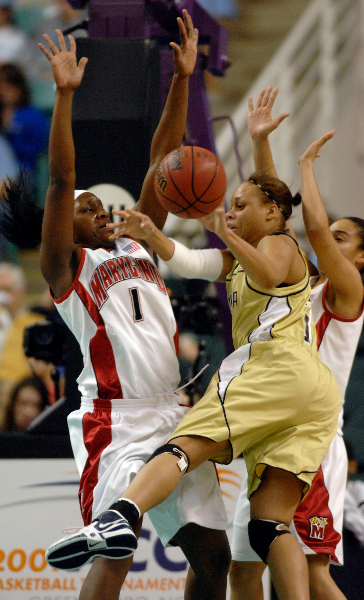 Maryland's Crystal Langhorne (1) guards Georgia Tech's Stephanie Higgs during the first half of an ACC Tournament college basketball game in Greensboro, N.C., Friday, March 2, 2007. (AP Photo/Sara D. Davis)