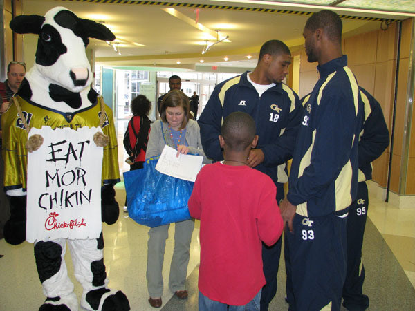 Yellow Jackets visit children at Egleston Hospital.