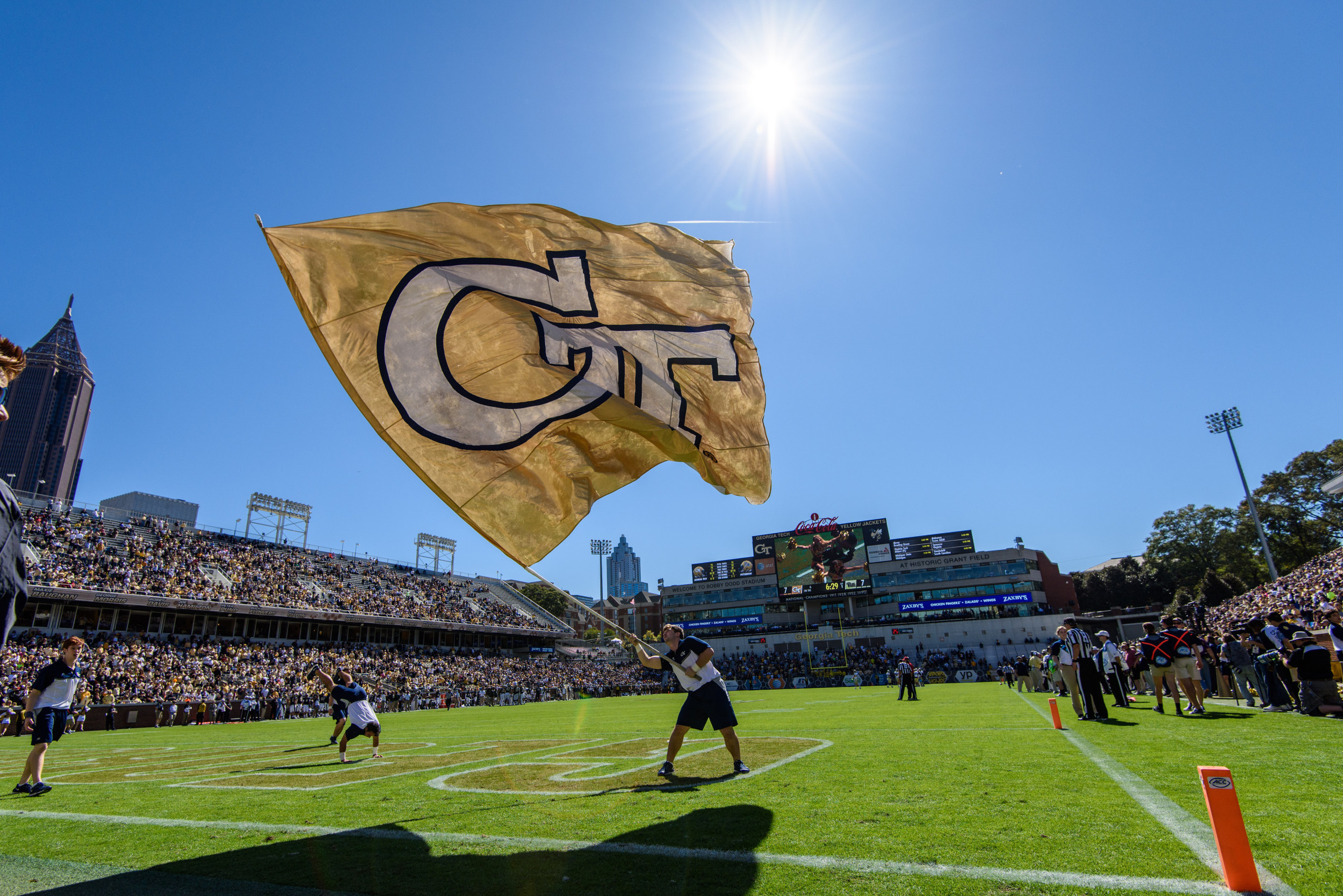 The GT flag flies after a touchdown.