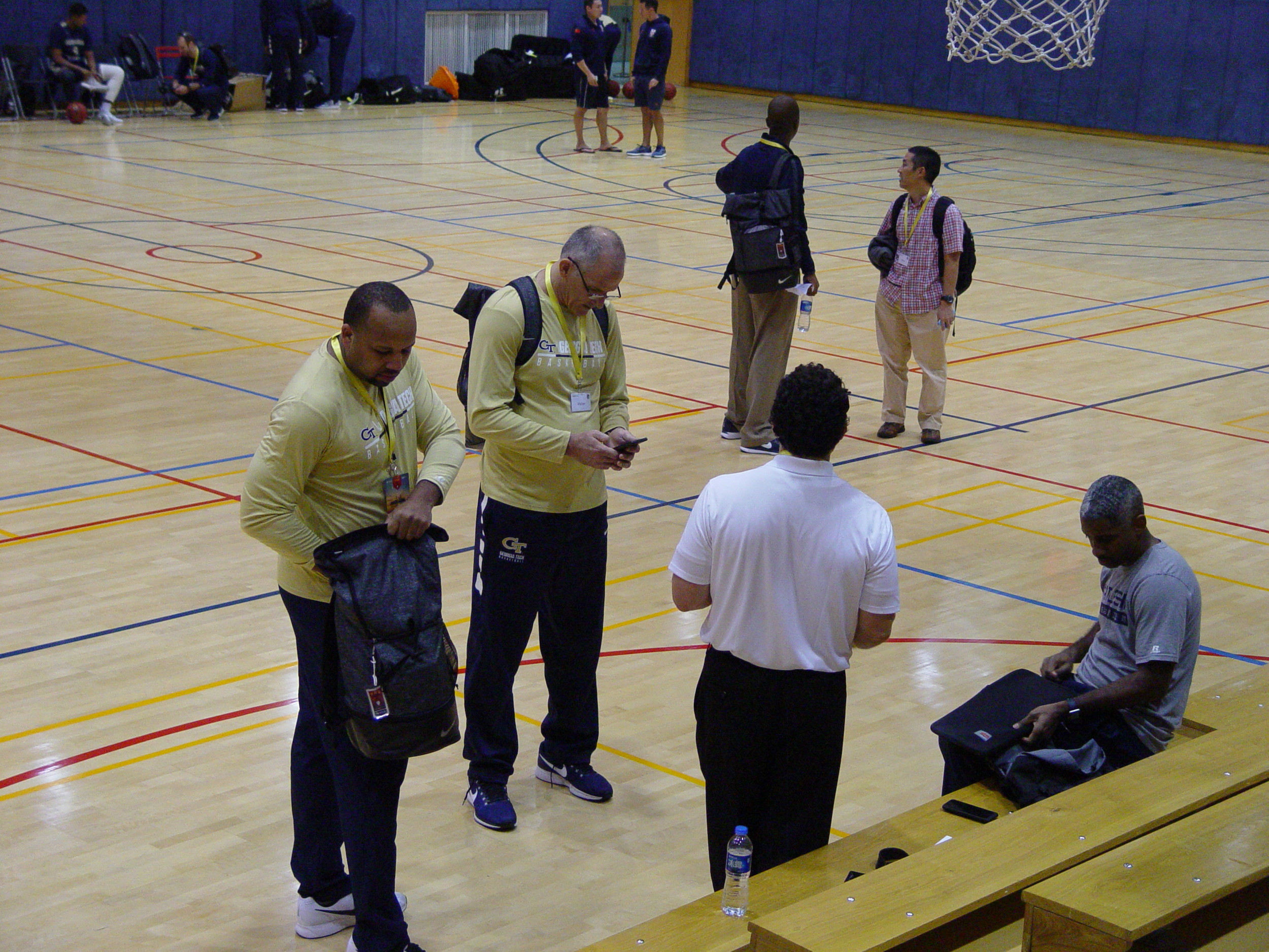 Georgia Tech coaches make final plans for teaml practice, Dulwich College, Shanghai, China, November 8, 2017