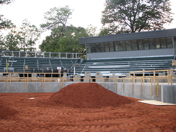 The area behind home plate will feature chair back seating. The areas in the front with the wood up now will be VIP seating right on top of the action.