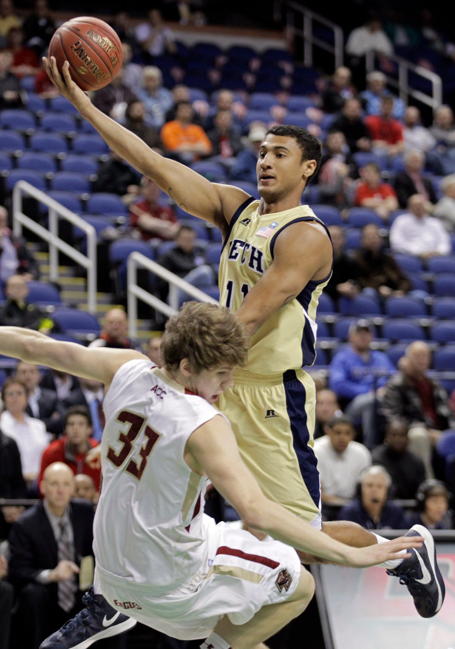 Georgia Tech's Chris Bolden (11) drives against Boston College's Patrick Heckmann (33). (AP Photo/Bob Leverone)