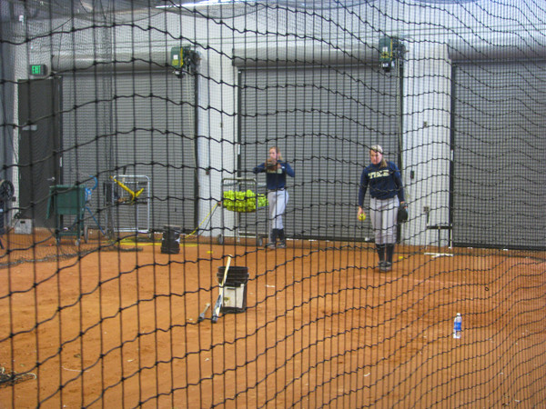 Softball team practices in its new stadium for the first time.