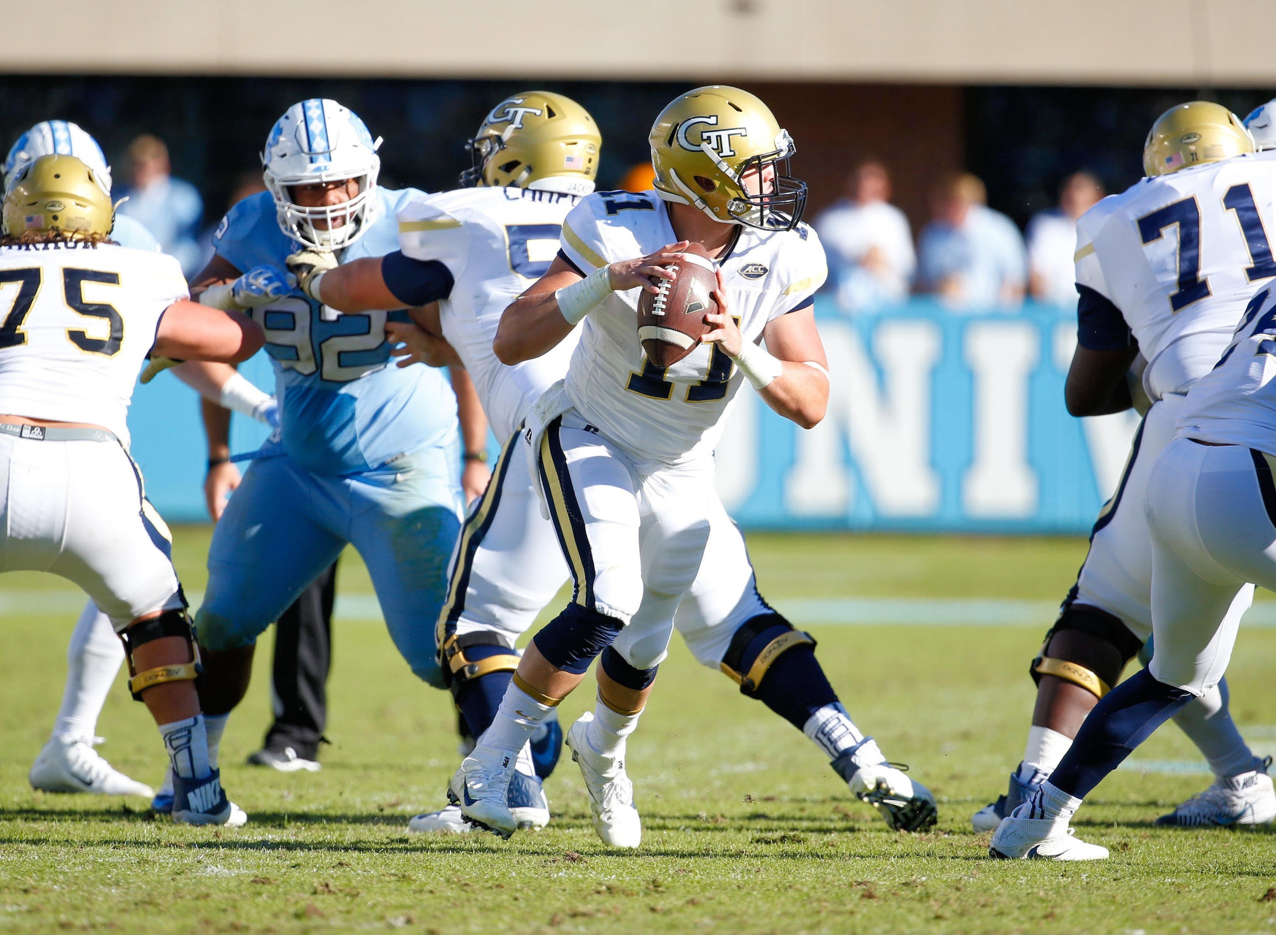 Yellow Jackets quarterback Matthew Jordan (11) looks to throw the ball during the third quarter against the North Carolina Tar Heels at Kenan Memorial Stadium. The North Carolina Tar Heels defeated the Georgia Tech Yellow Jackets 48-20. Credit: James Guillory-USA TODAY Sports