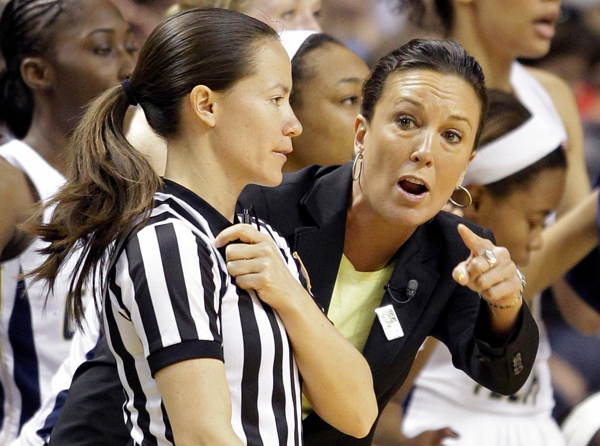 MaChelle Joseph, right argues a call with a referee. (AP Photo/Chuck Burton)