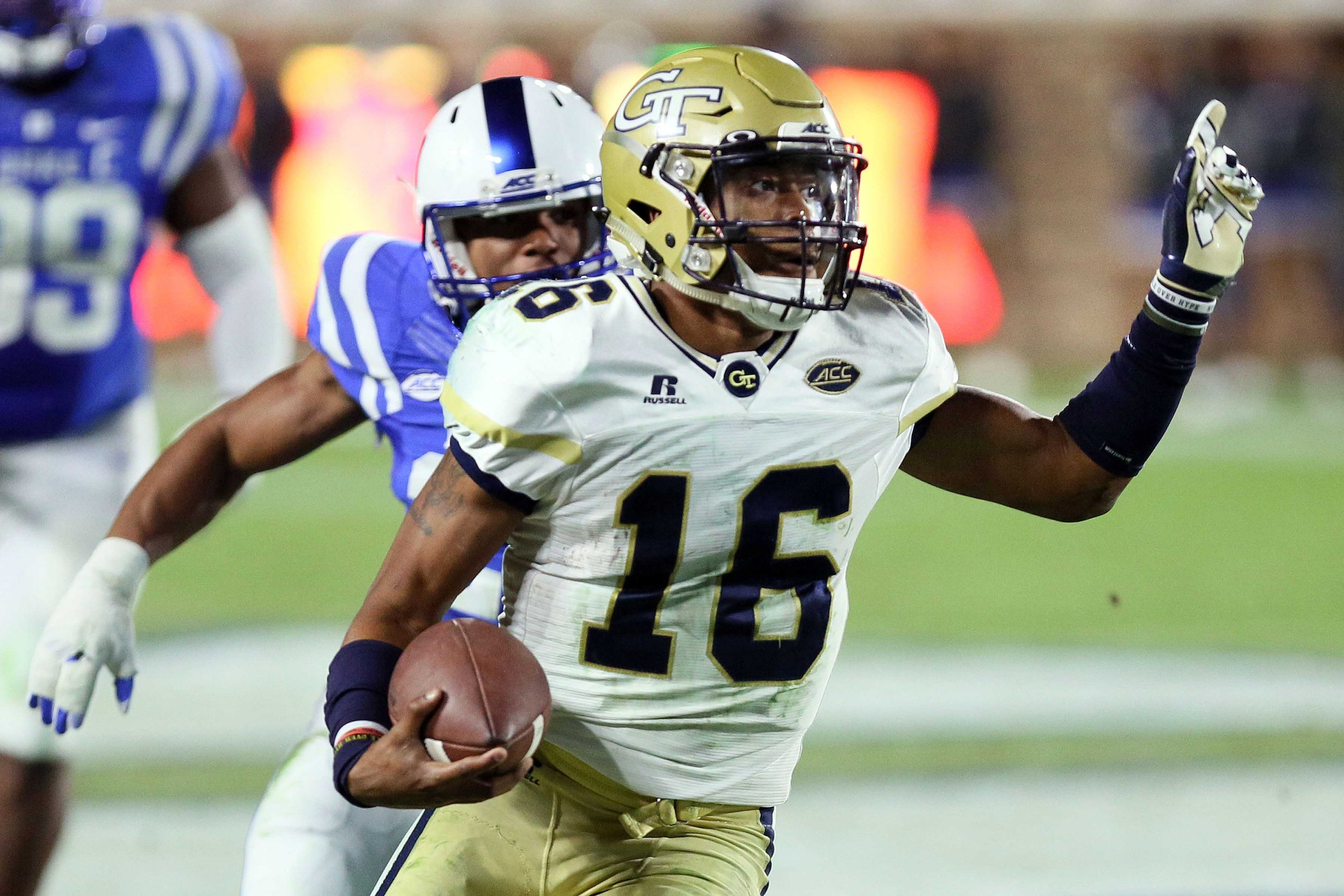Nov 18, 2017; Durham, NC, USA; Georgia Tech Yellow Jackets quarterback TaQuon Marshall (16) looks for running room as he keeps the ball against the Duke Blue Devils in the second half at Wallace Wade Stadium. Duke beat the Georgia Tech 42-20. Mandatory Credit: Mark Dolejs-USA TODAY Sports