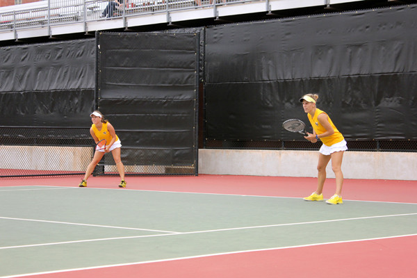 Alex Anghelescu and Jillian O'Neill during doubles play against Alabama in an NCAA Second Round match.