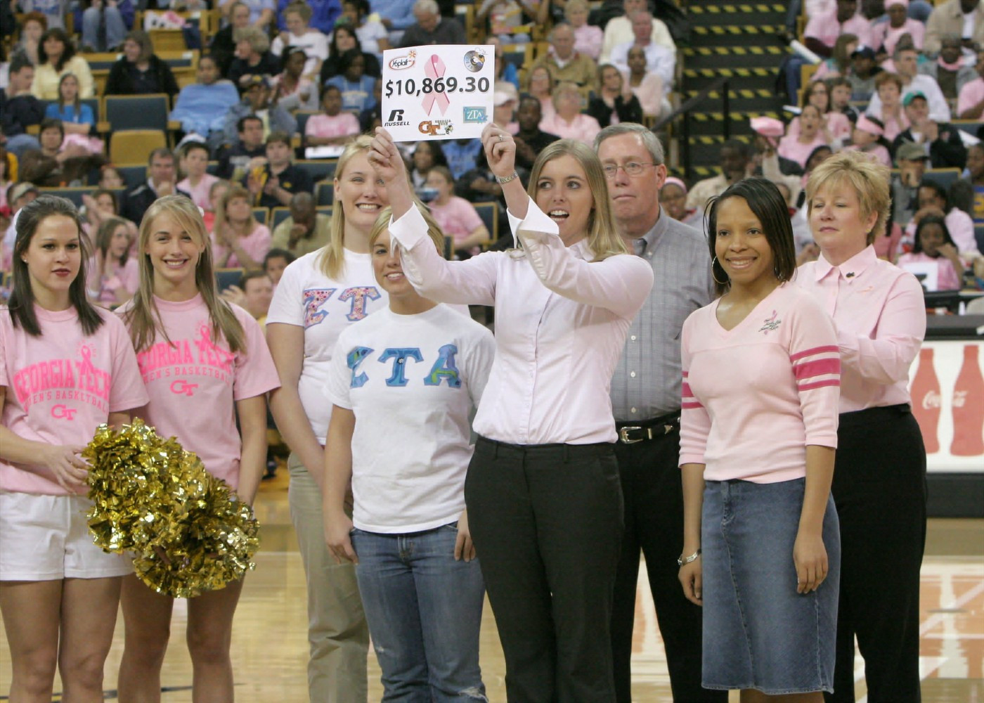 Georgia Tech and Zeta Tau Alpha Sorority present the Atlanta Susan G. Komen Foundation with a check