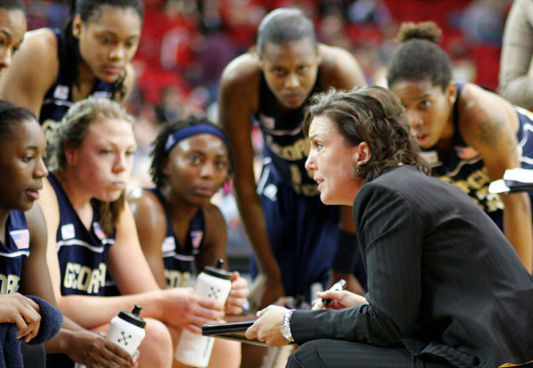 Head Coach MaChelle Joseph speaks with team during timeout