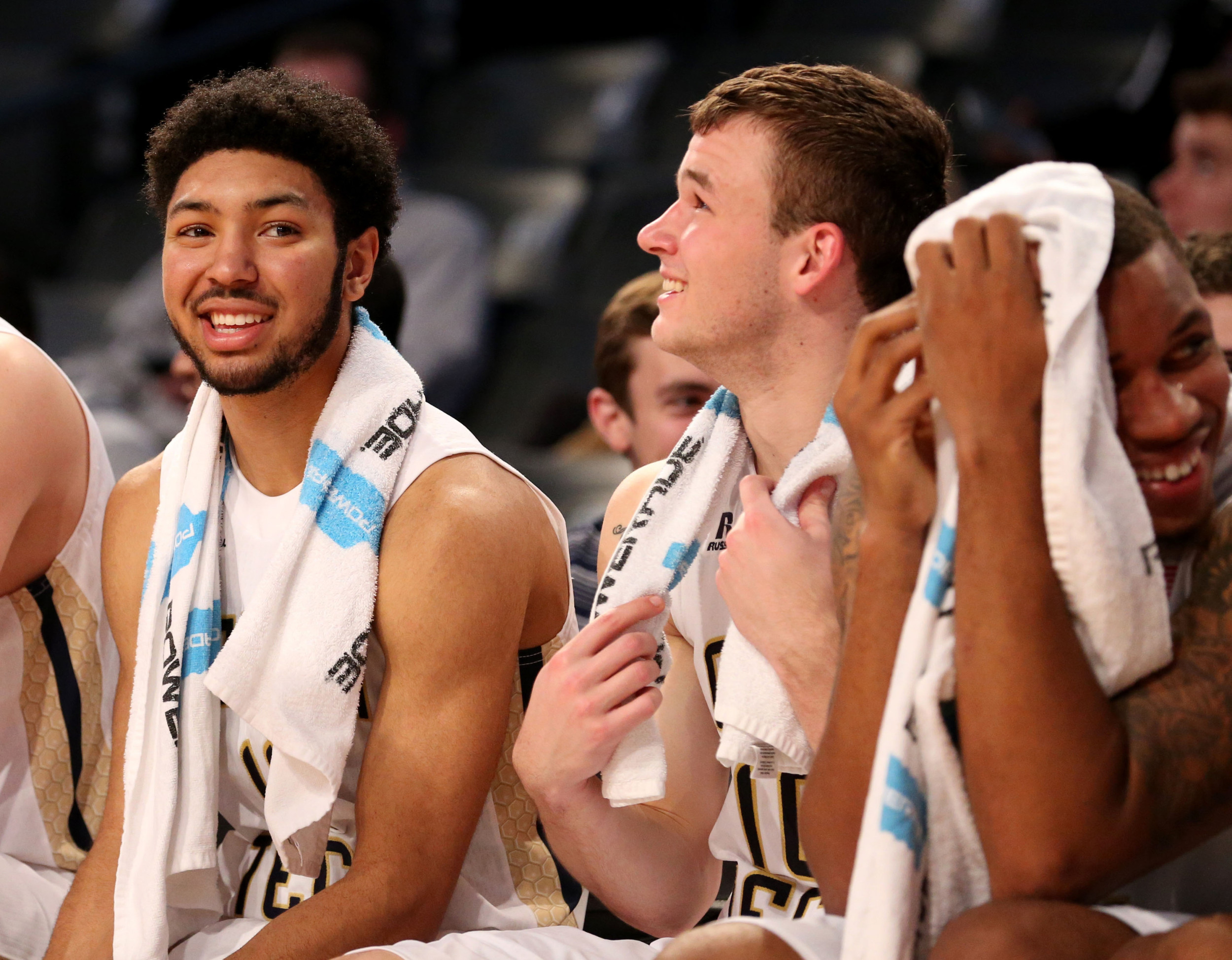 Dec 1, 2015; Atlanta, GA, USA; Georgia Tech Yellow Jackets guard Adam Smith (2, left) celebrates with teammates on the bench in the second half of their game against the Wofford Terriers at McCamish Pavilion. The Yellow Jackets won 77-61. Mandatory Credit: Jason Getz-USA TODAY Sports