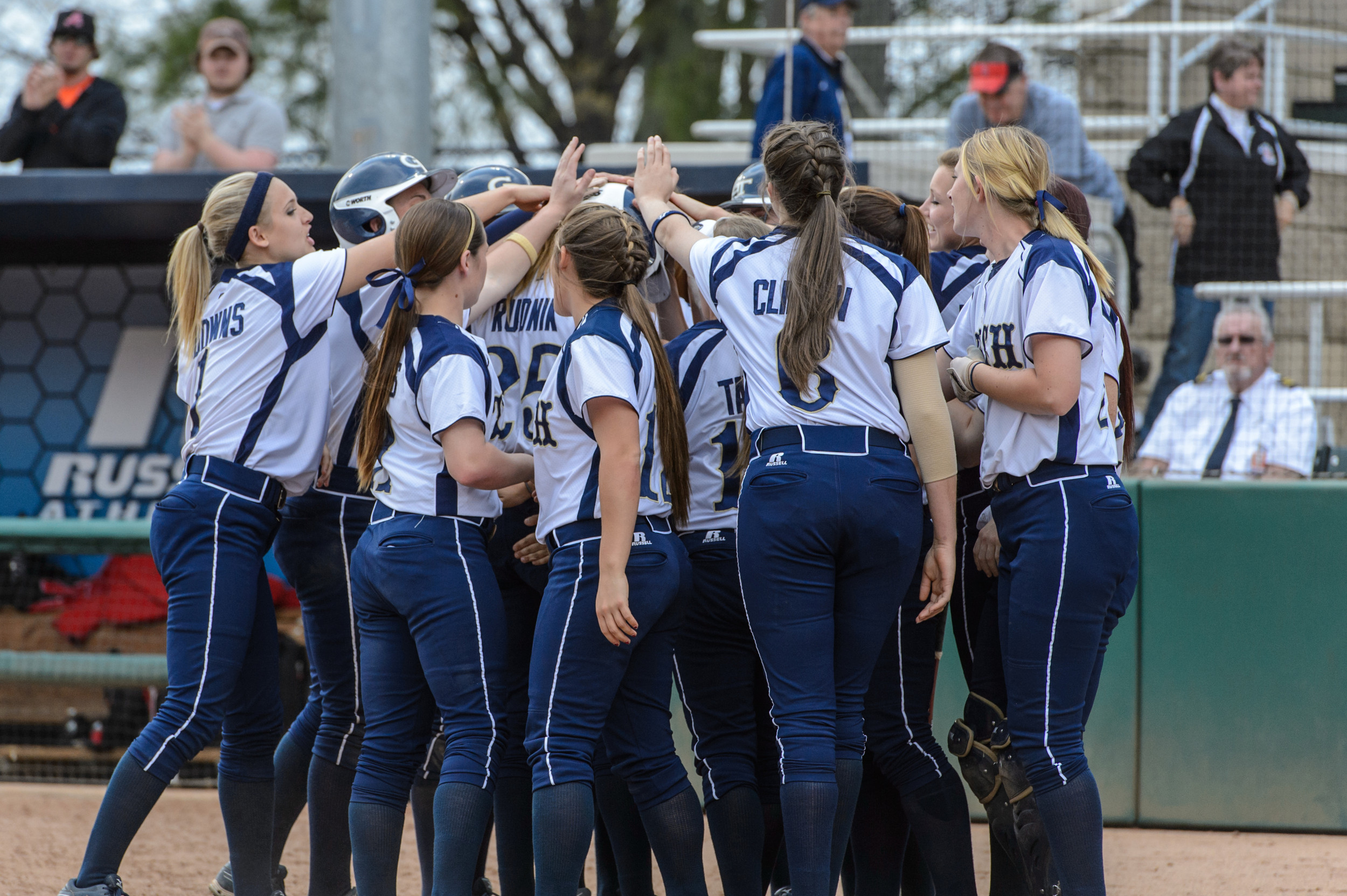 The team celebrates Alysha Rudnik's home run.