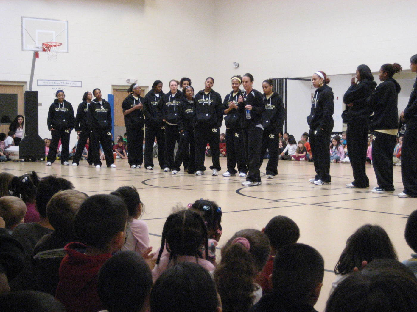 Head Coach MaChelle Joseph reminds the students to put school first