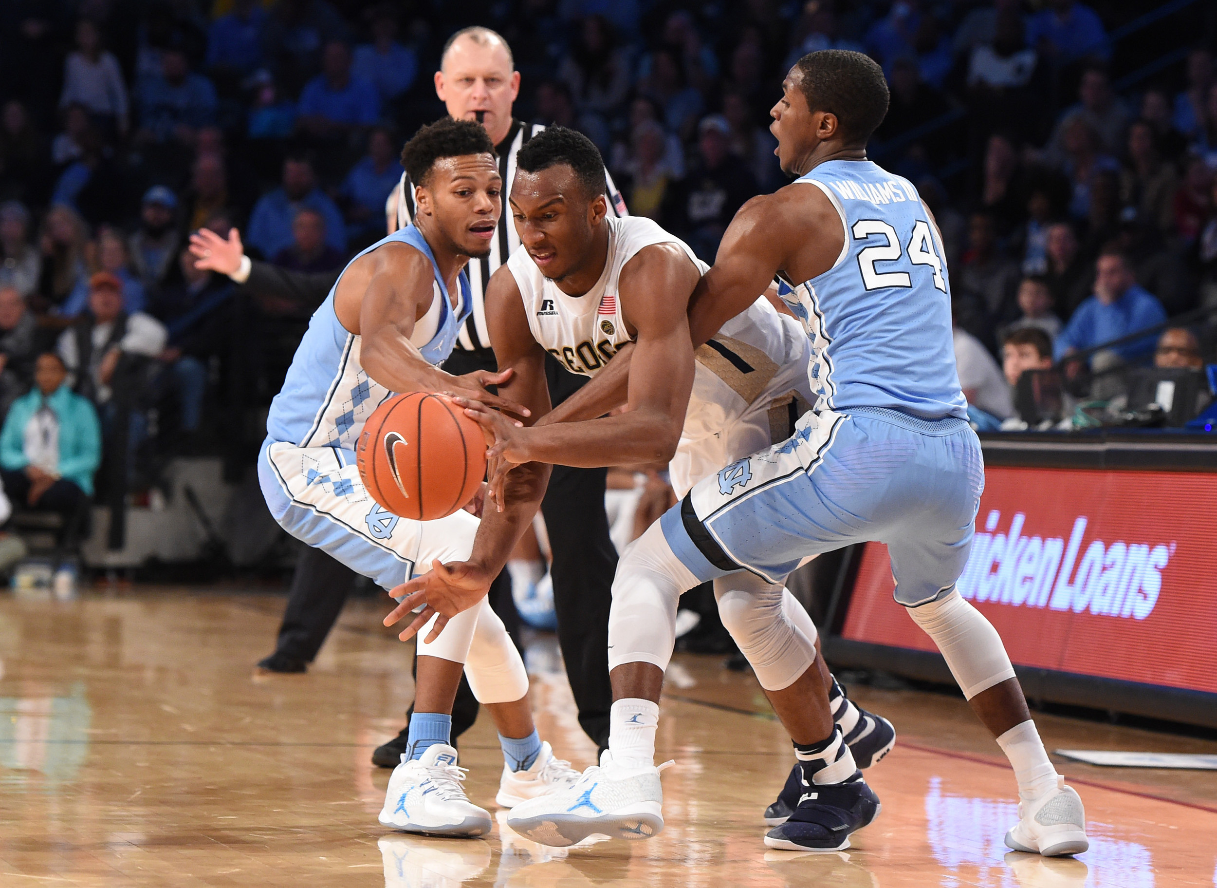 Georgia Tech Yellow Jackets guard Josh Okogie (5) in action against North Carolina Tar Heels guard Nate Britt (0) and guard Kenny Williams (24) at McCamish Pavilion. Adam Hagy-USA TODAY Sports