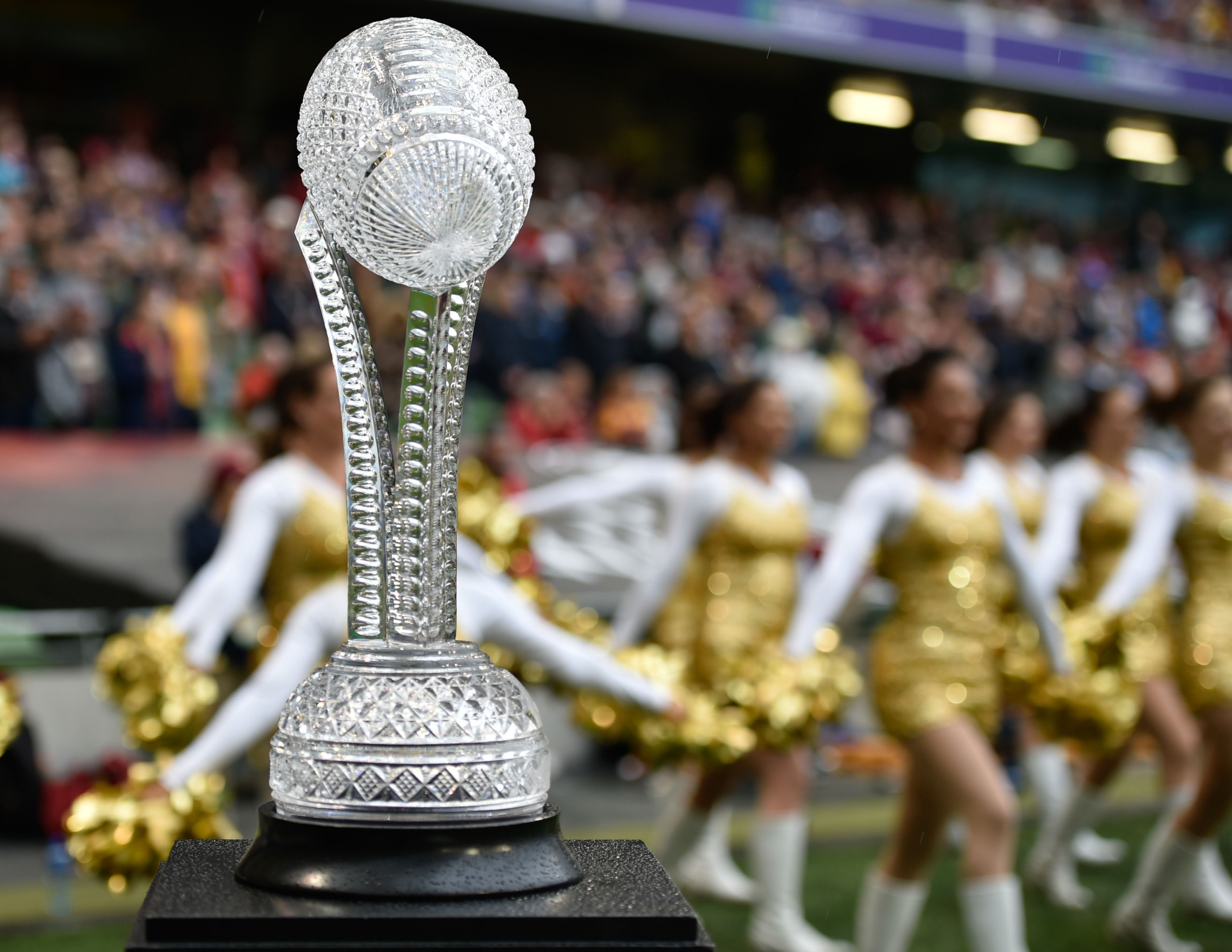 Sep 3, 2016; Dublin, IRL; Boston College Eagles cheerleaders perform behind the Keough-Naughton Trophy during the first quarter of the game between the Boston College Eagles and the Georgia Tech Yellow Jackets at Aviva Stadium. Mandatory Credit: Steve Flynn-USA TODAY Sports