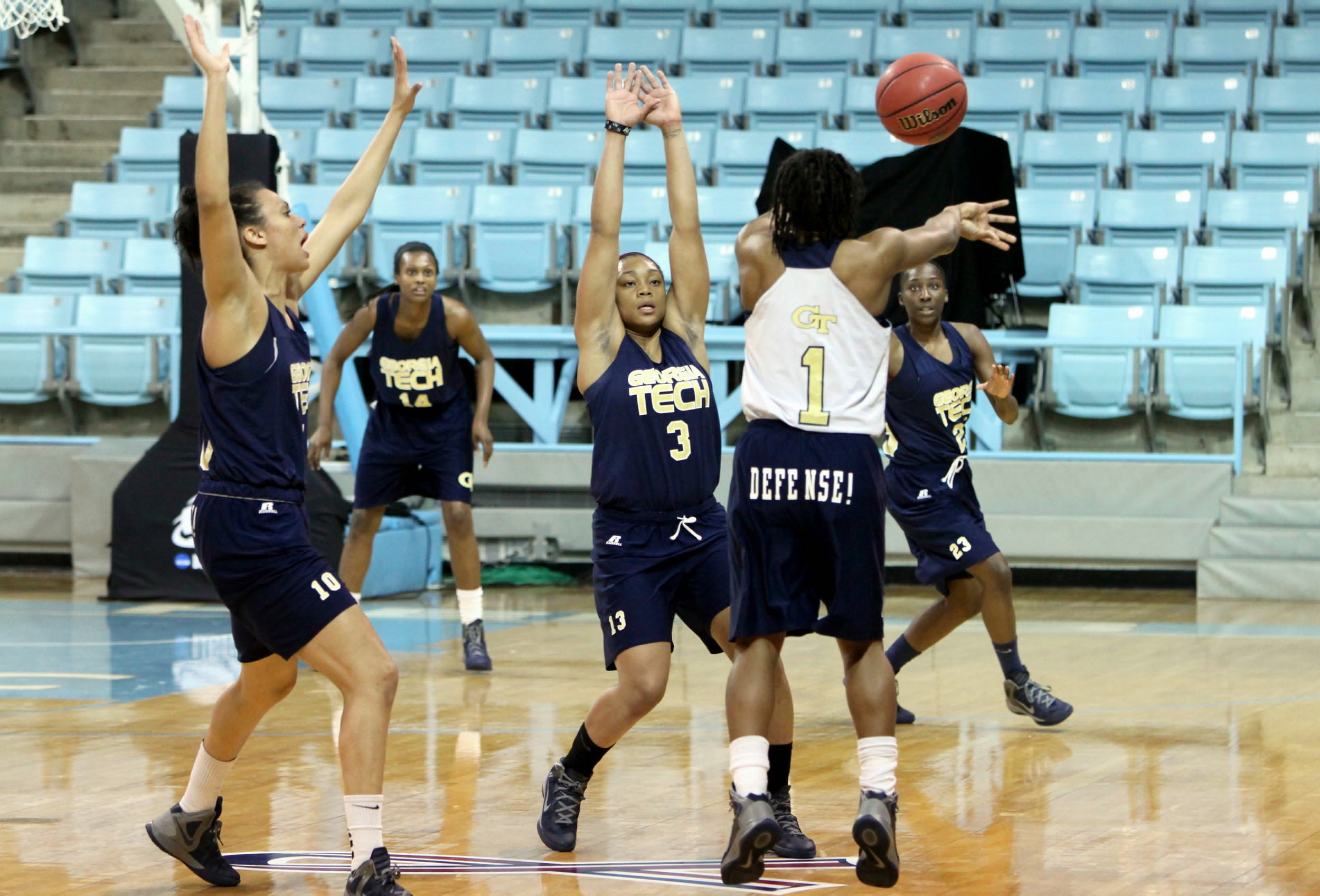 Dawnn Maye throws a pass past the defense in Georgia Tech's NCAA Tournament Second Round practice.
