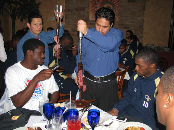 Yellow Jackets eat dinner at Fire of Brazil.