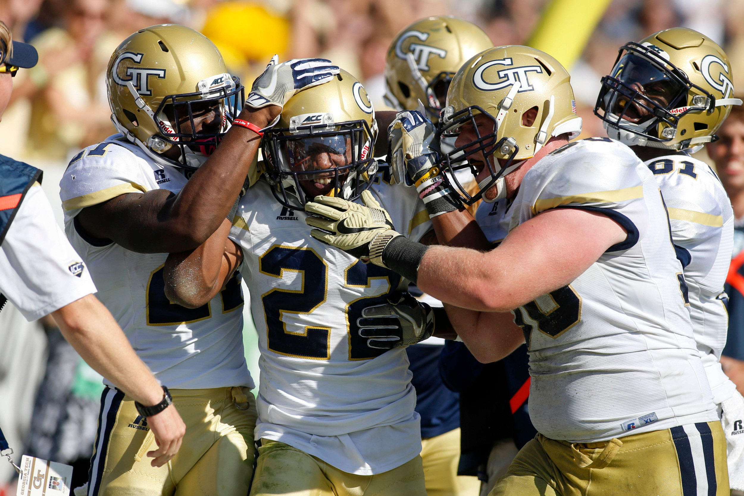 Yellow Jackets running back Clinton Lynch (22) celebrates a touchdown catch with teammates. Brett Davis-USA TODAY Sports