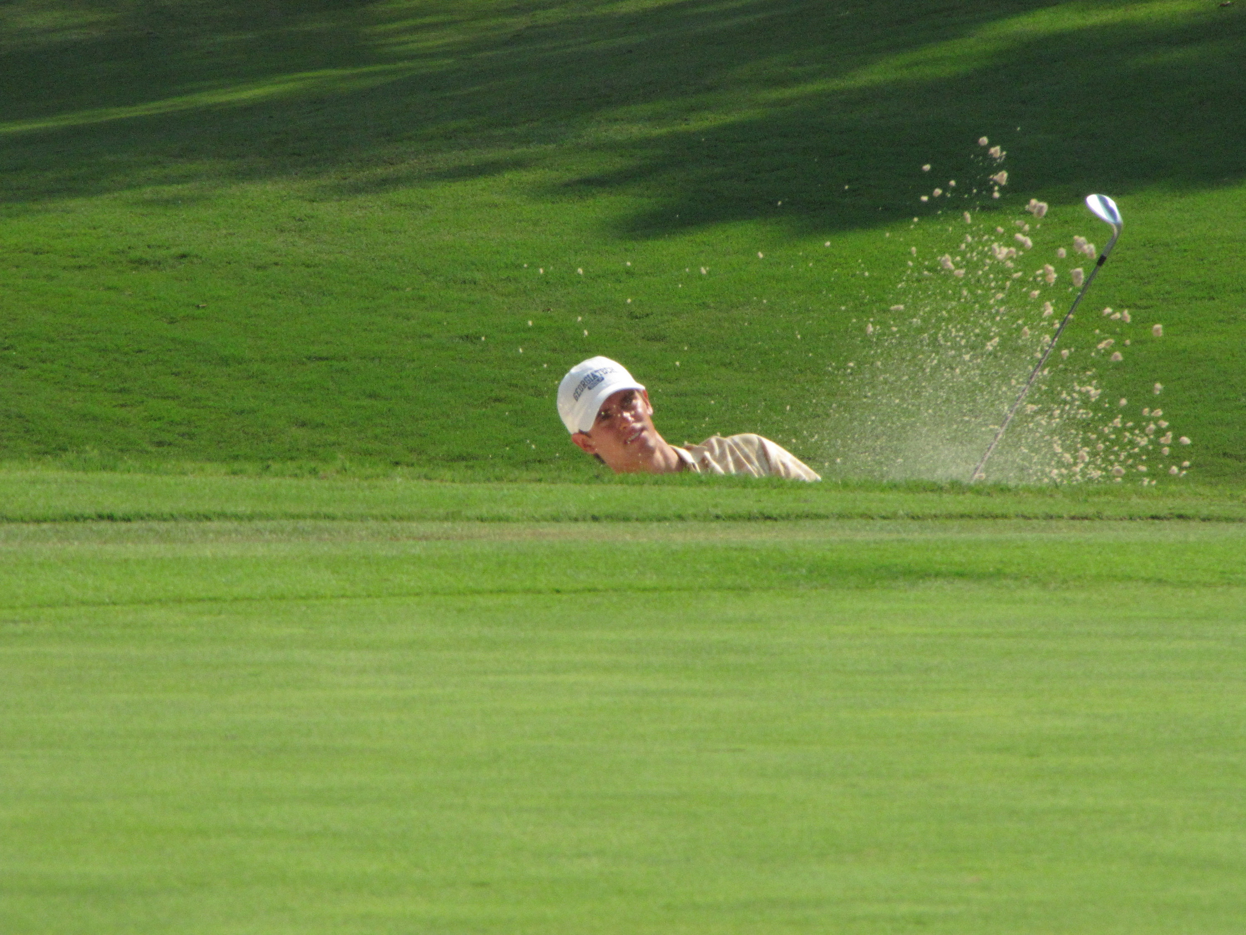 James White hits out of a bunker during Georgia Tech's preseason qualifying, September 3 at the Golf Club of Georgia.