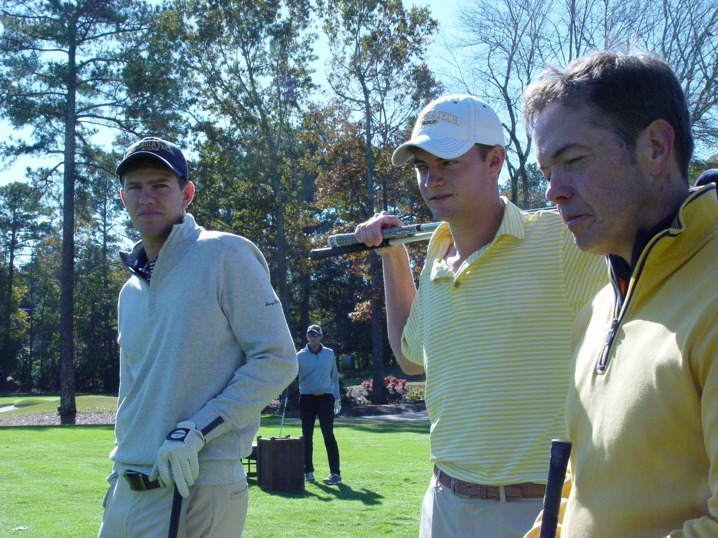 Former Jacket Michael Hines (left), current freshman Tyler Strafaci and booster Mickey King at the Ramblin' Wreck Cup, November 12, 2017