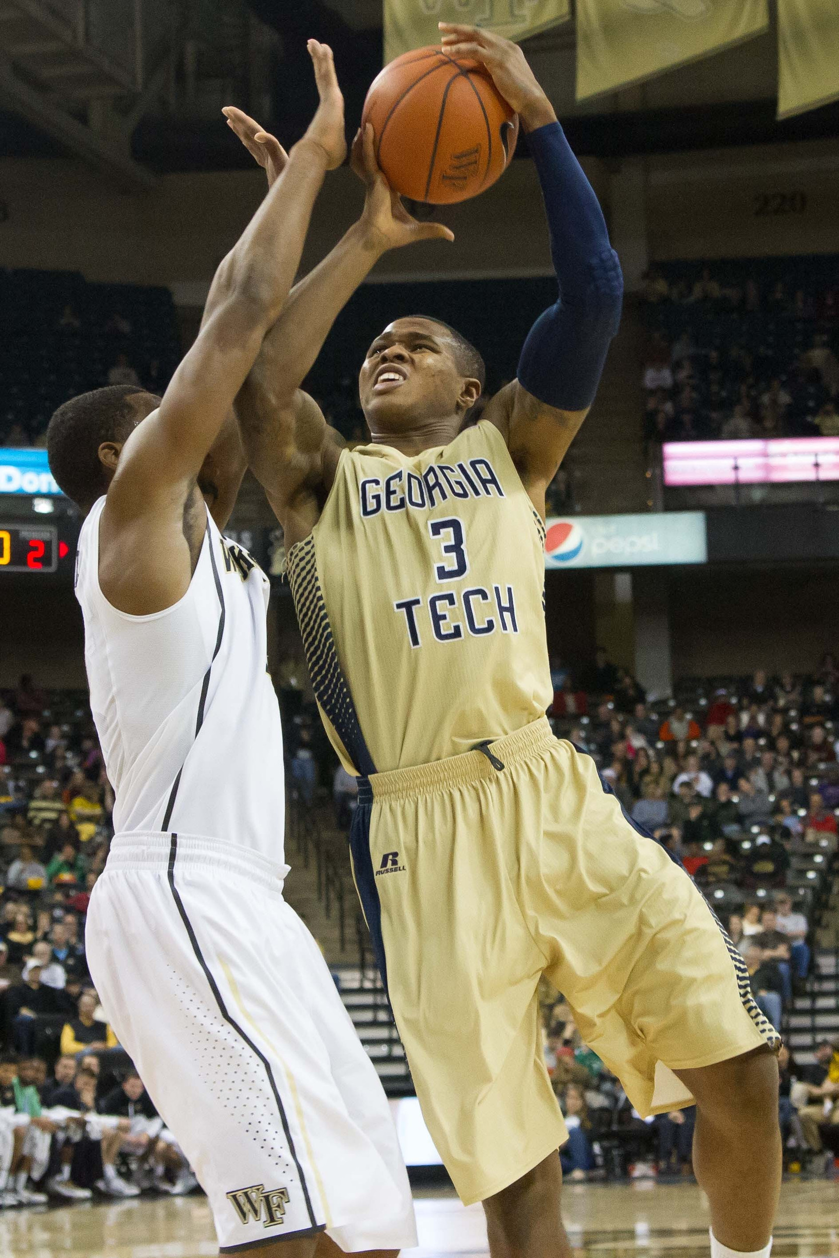 Georgia Tech Yellow Jackets forward Marcus Georges-Hunt (3) shoots the ball over Wake Forest Demon Deacons guard Codi Miller-McIntyre (0) during the second half at Lawrence Joel Veterans Memorial Coliseum. Wake Forest defeated Georgia Tech 76-69. Mandatory Credit: Jeremy Brevard-USA TODAY Sports