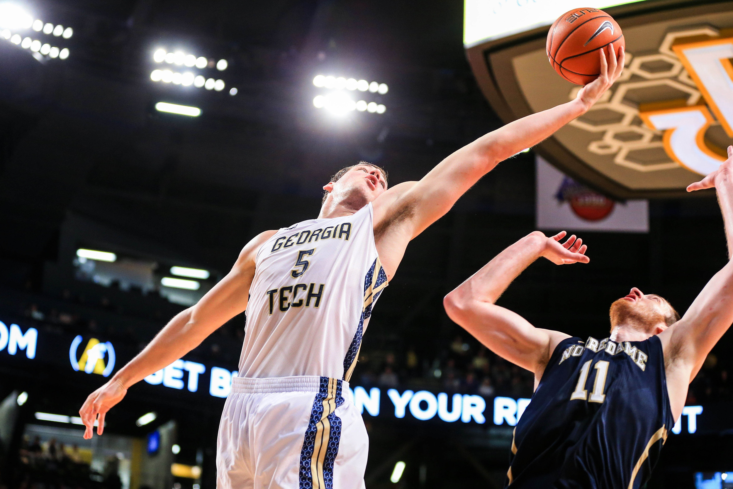 Jan 11, 2014; Atlanta, GA, USA; Georgia Tech Yellow Jackets center Daniel Miller (5) grabs a rebound in the second half against the Notre Dame Fighting Irish at Hank McCamish Pavilion. Georgia Tech won 74-69. Mandatory Credit: Daniel Shirey-USA TODAY Sports