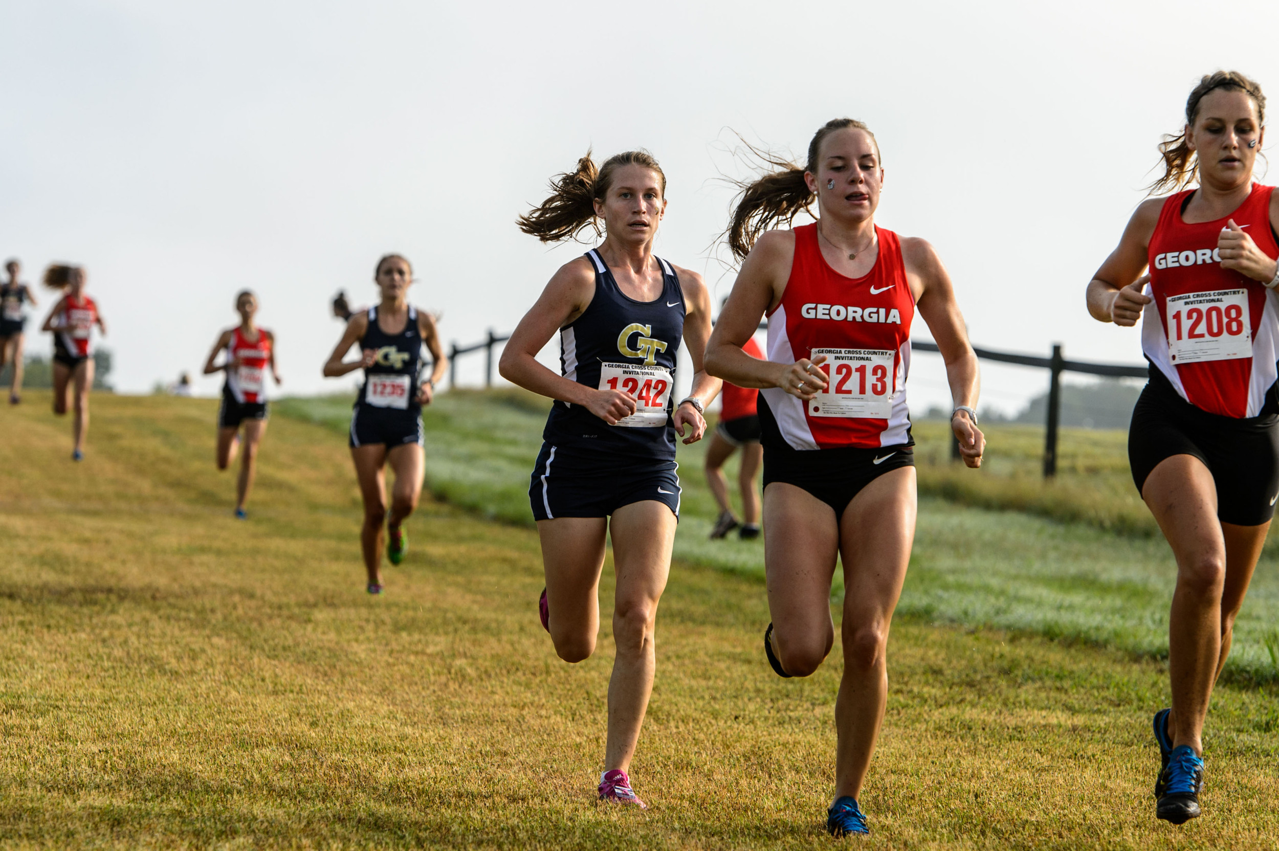 The Women's Cross Country team runs at the UGA Invitational