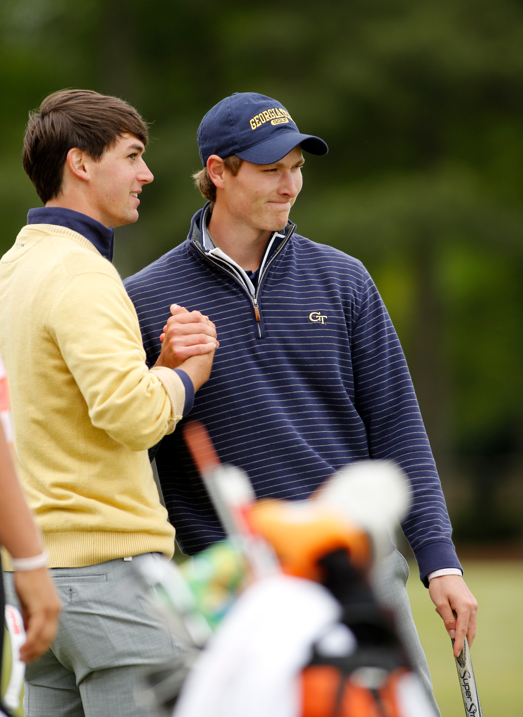 Georgia Tech teammates shake hands as Georgia Tech wins the 2015 ACC men's golf championship at the Old North State club in New London, N.C., Sunday, April 26, 2015. (Photo by Nell Redmond, theACC.com)