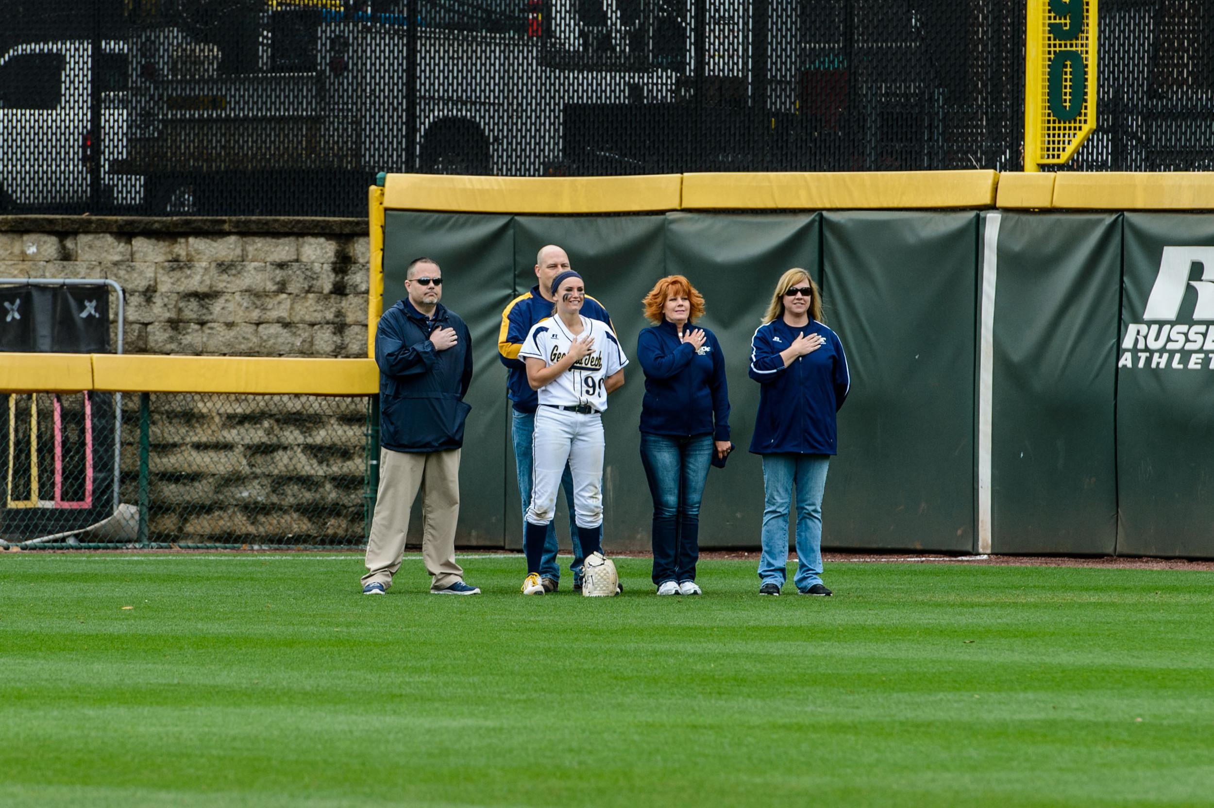 Families went with the players out to their positions for the national anthem