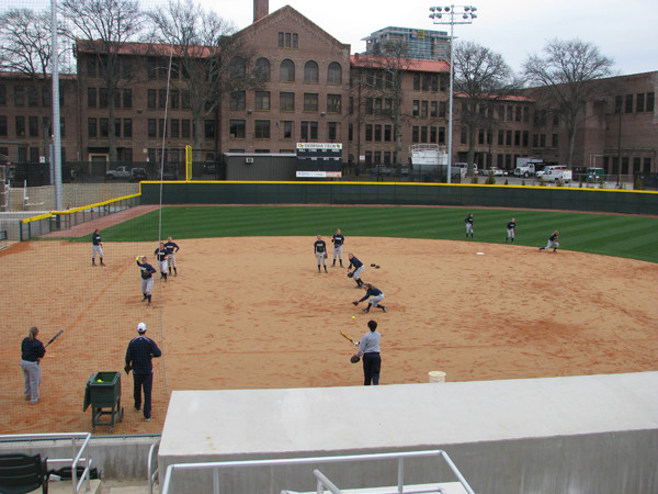 Softball team practices in its new stadium for the first time.