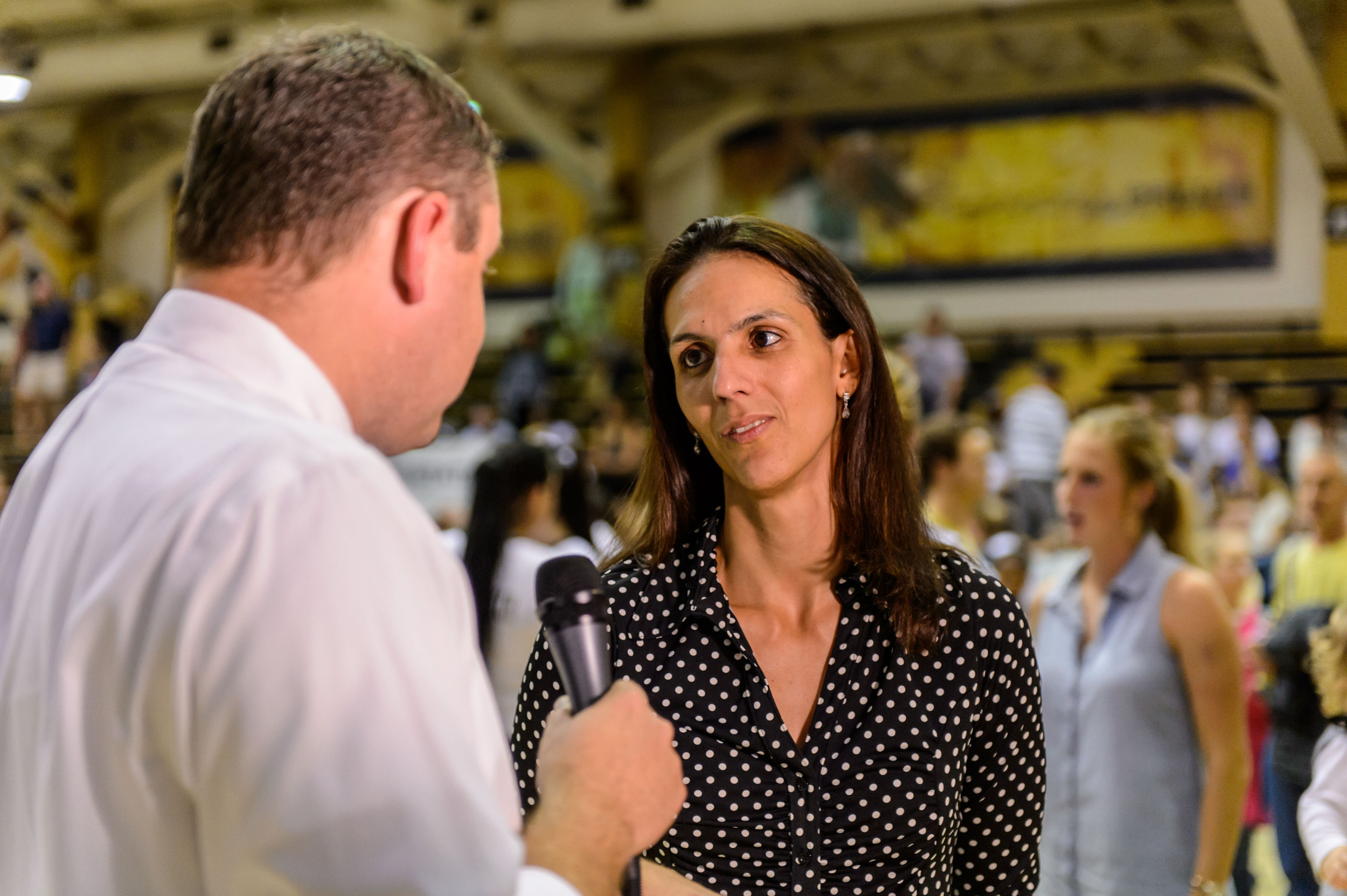 Coach Michelle Collier is interviewed after the win