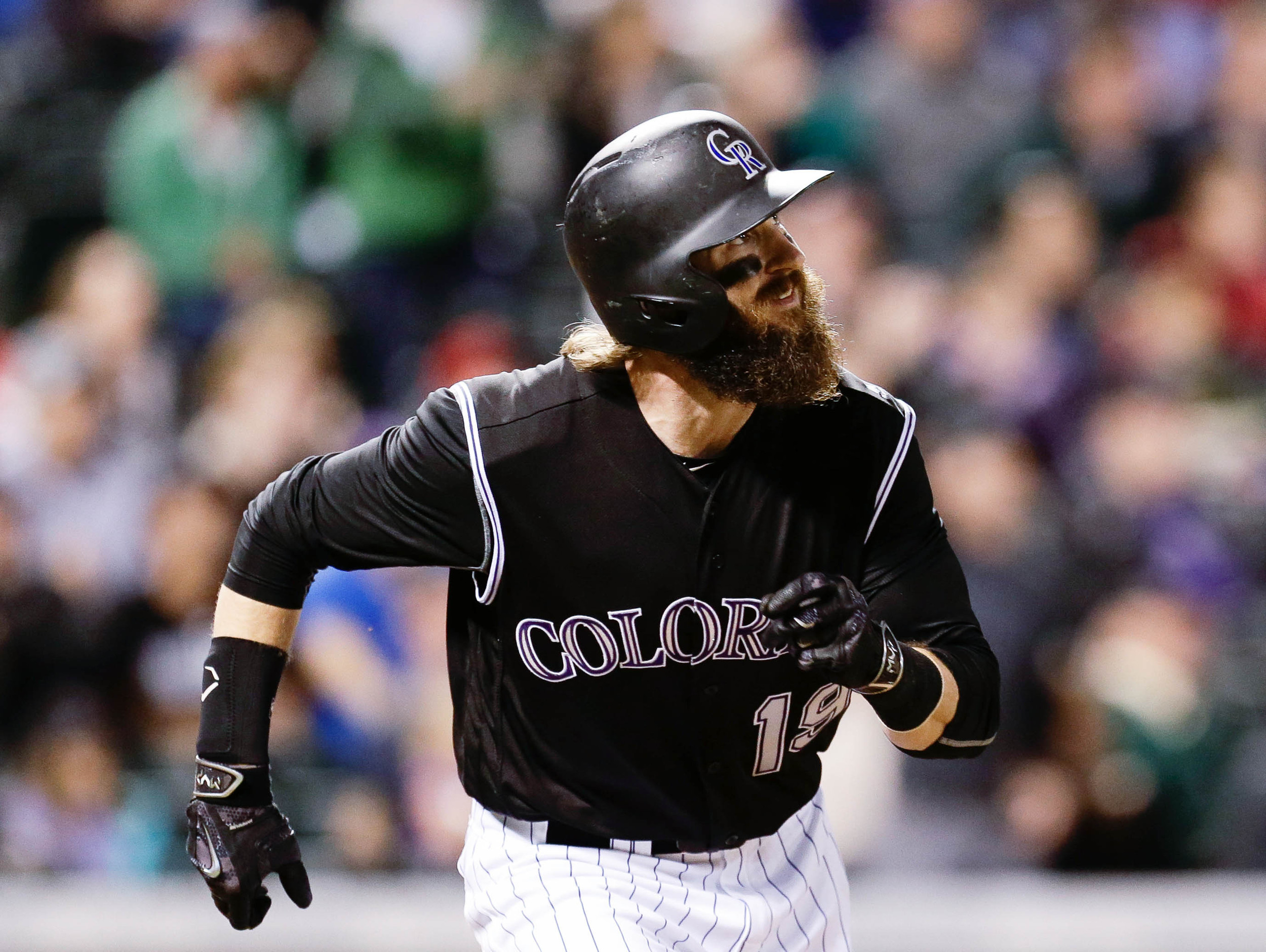 Colorado Rockies center fielder Charlie Blackmon (19) watches his ball after hitting a three run home run in the seventh inning against the Cincinnati Reds. Credit: Isaiah J. Downing-USA TODAY Sports
