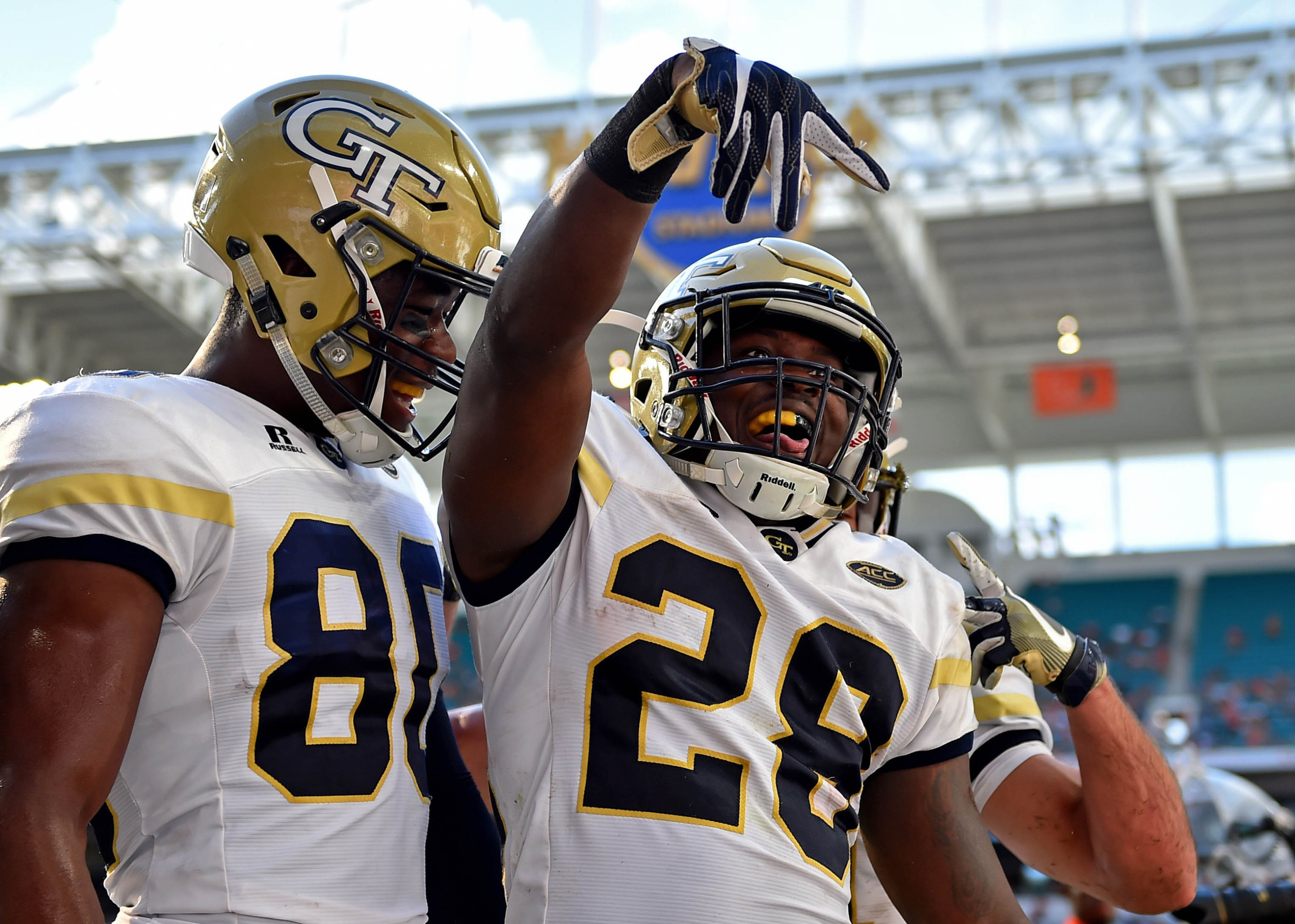 Georgia Tech Yellow Jackets running back J.J. Green (28) celebrates his touchdown during the first half against the Miami Hurricanes at Hard Rock Stadium. Steve Mitchell-USA TODAY Sports
