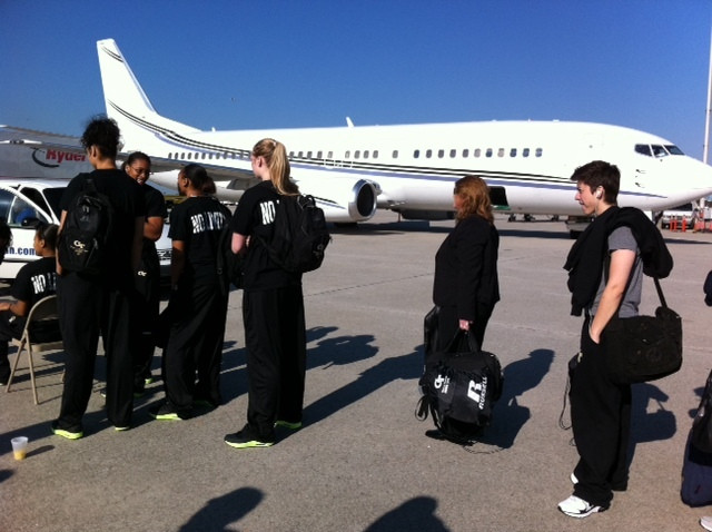The Yellow Jackets getting ready to board plane to Columbus (Denver Nuggets plane in background)