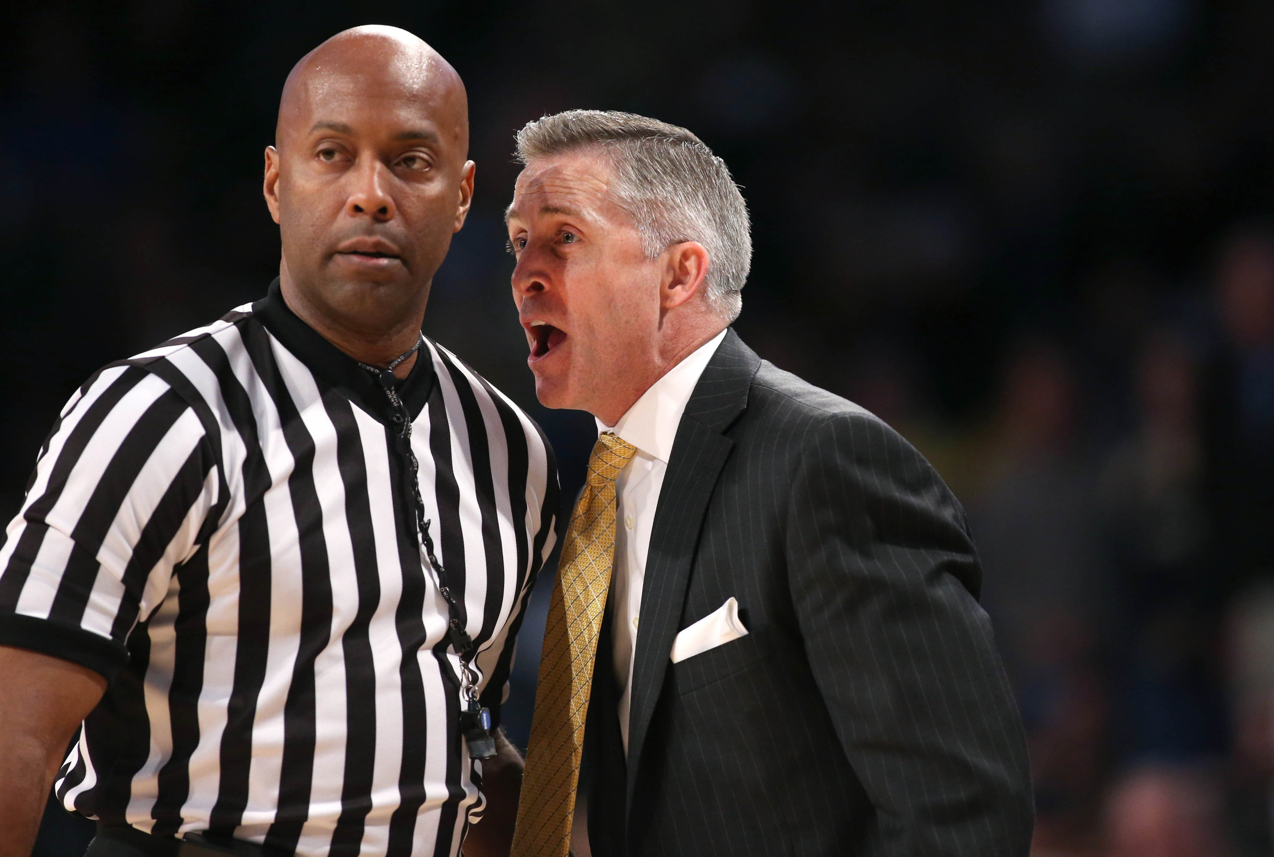 Jan 14, 2015; Atlanta, GA, USA; Georgia Tech Yellow Jackets head coach Brian Gregory argues a call with an official in the second half of their game against the Notre Dame Fighting Irish at McCamish Pavilion. Notre Dame won 62-59.