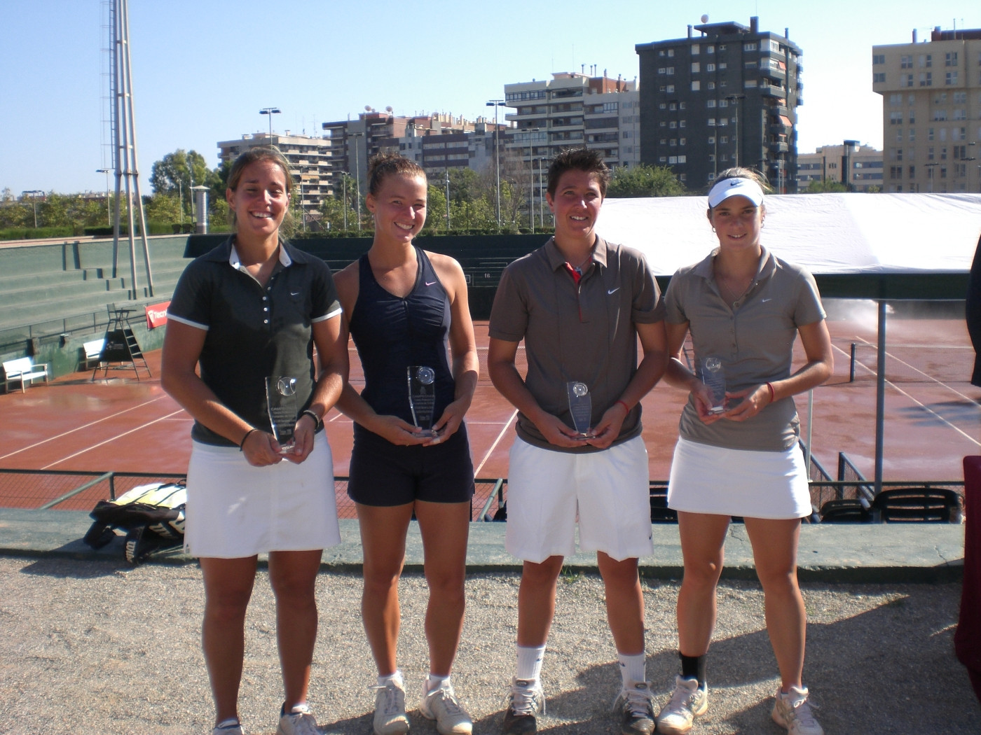 Kristi Miller with championship trophy