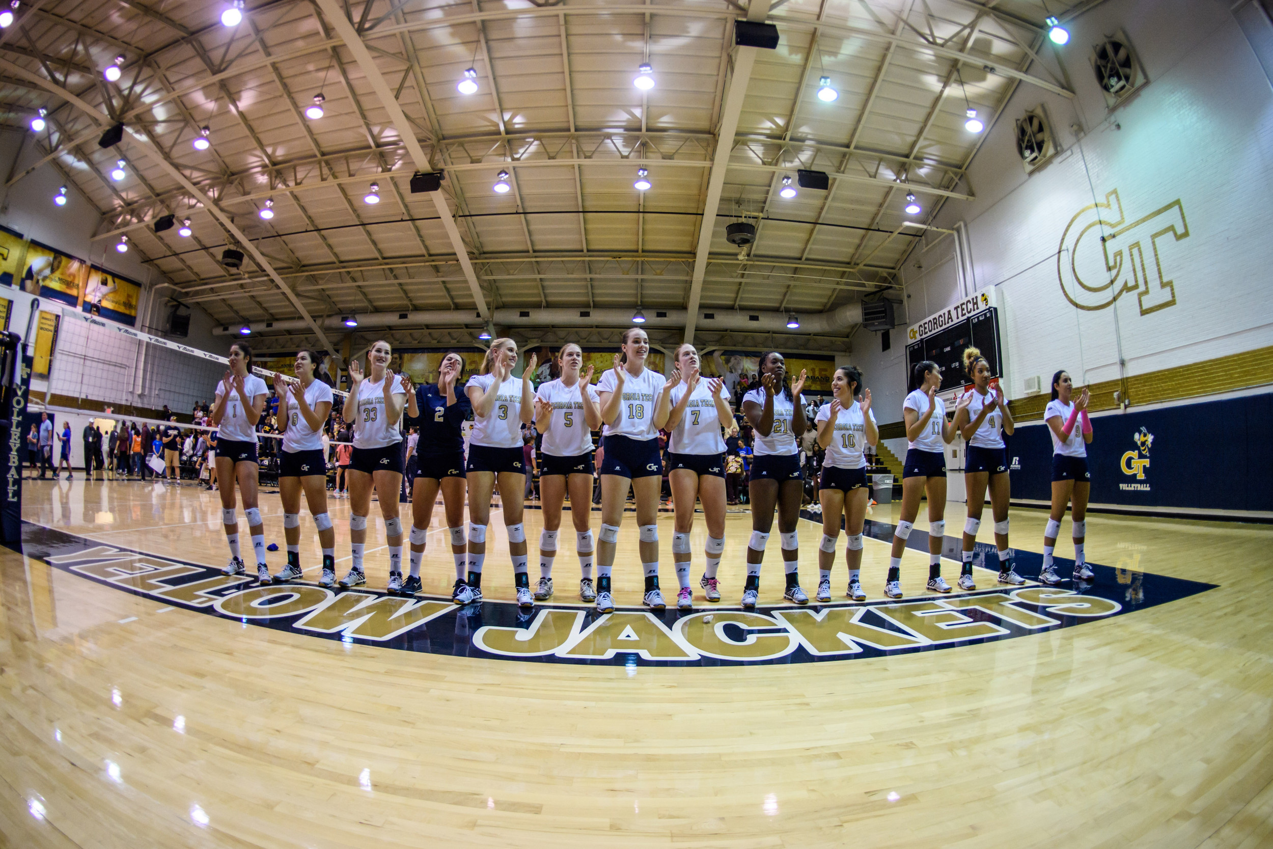 The Jackets sing the fight song after the win