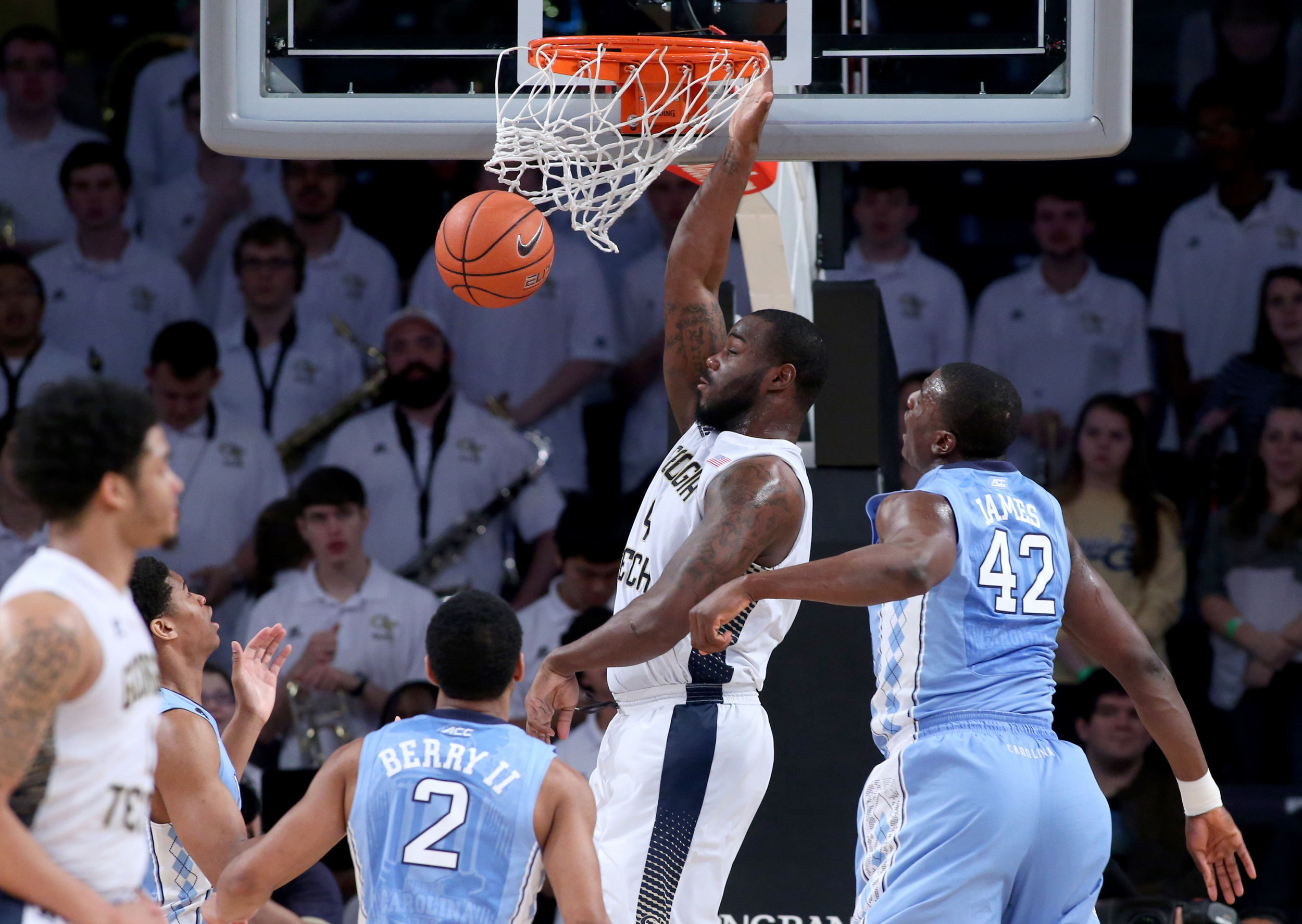 Georgia Tech Yellow Jackets center Demarco Cox (4) dunks against North Carolina Tar Heels forward Joel James (42) in the first half of their game at McCamish Pavilion. The Tar Heels won 81-49. Jason Getz-USA TODAY Sports