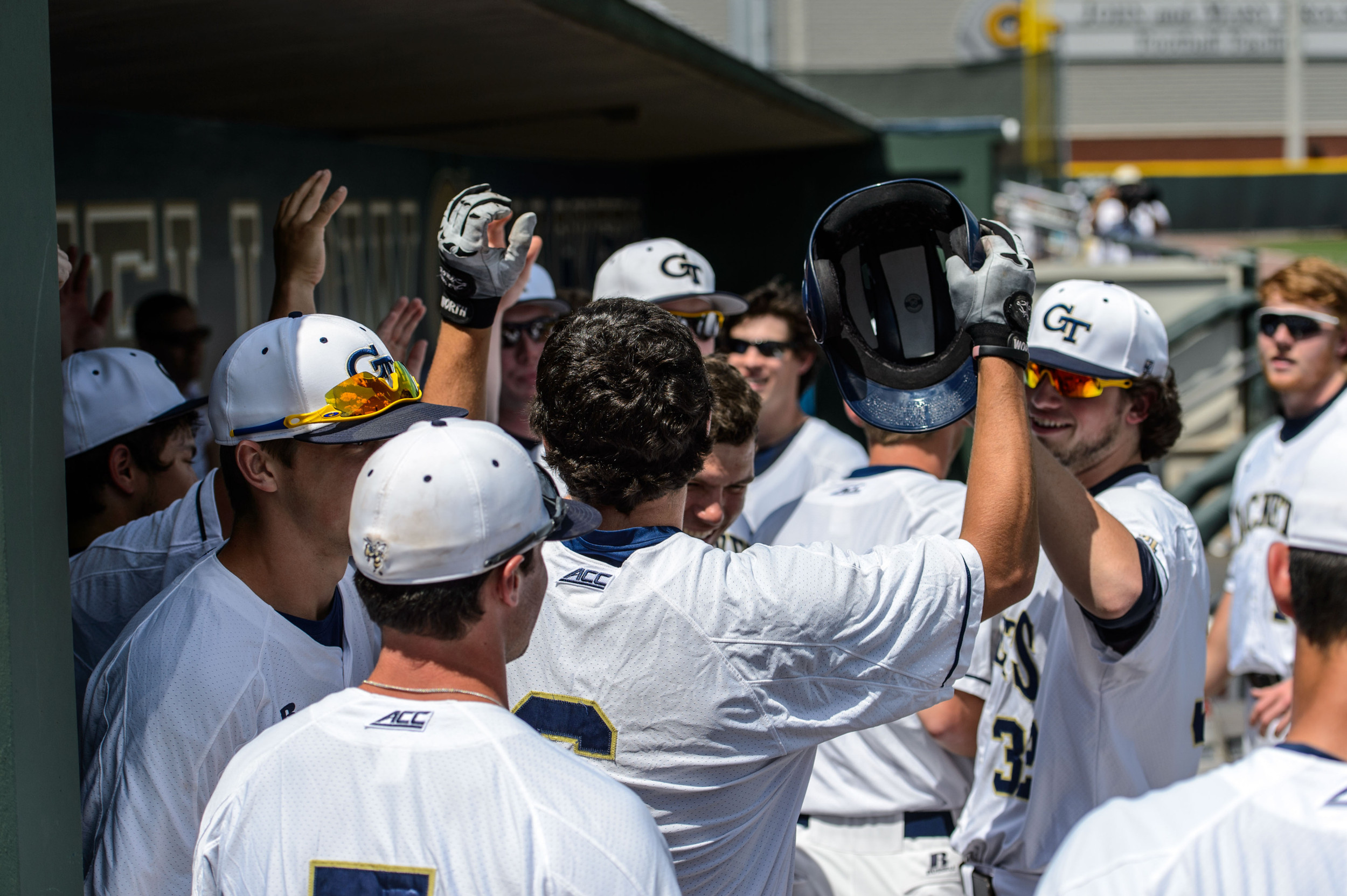 Ryan Peurifoy (6) is congratulated by teammates after his first career home run