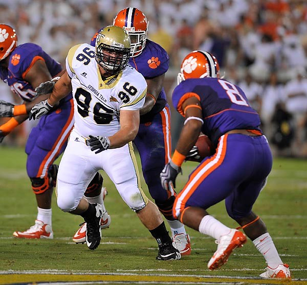 Logan Walls draws a bead of Clemson's C.J. Spiller. Photo by LensEffects