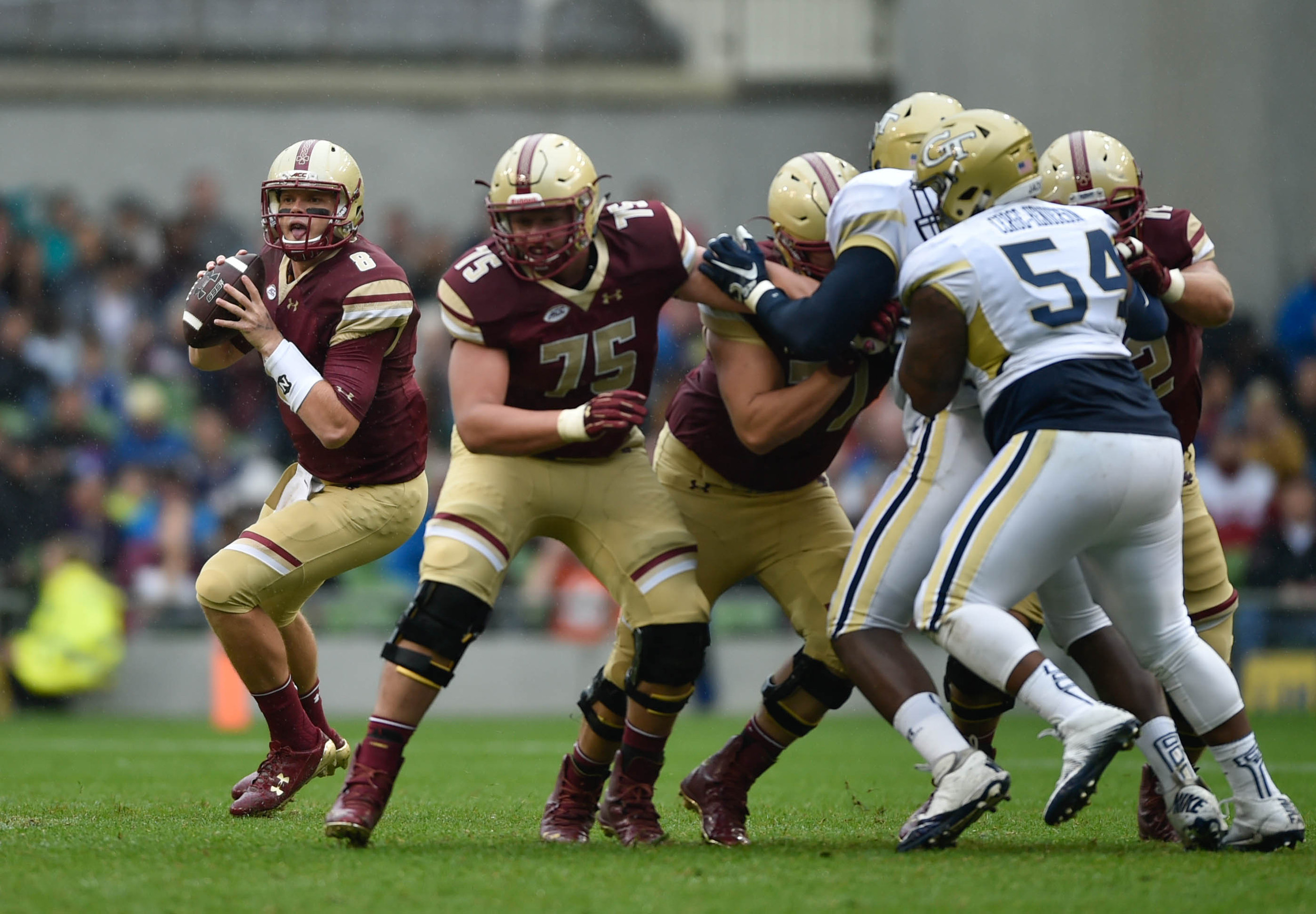 Sep 3, 2016; Dublin, IRL; Boston College Eagles quarterback Patrick Towles (8) drops back to pass during the second quarter of the game against the Georgia Tech Yellow Jackets at Aviva Stadium. Mandatory Credit: Steve Flynn-USA TODAY Sports