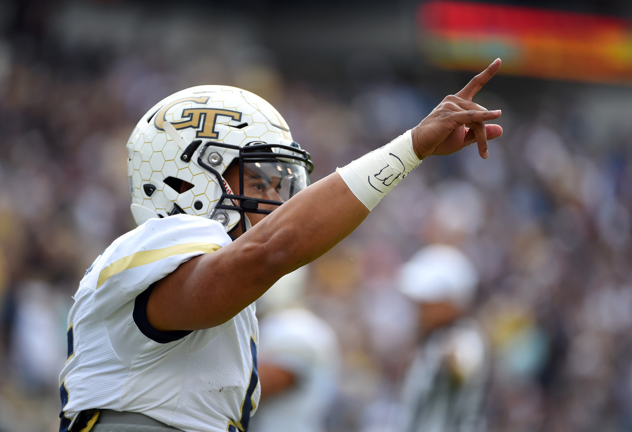 Georgia Tech quarterback Justin Thomas (5) celebrates on the field after a touchdown during the first quarter. Adam Hagy-USA TODAY Sports